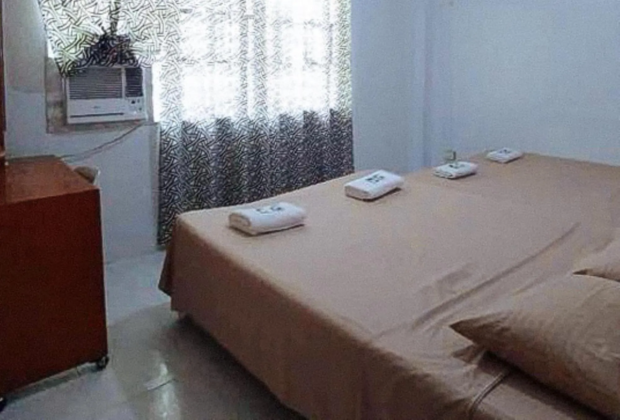 Bed in Sinoben Apartments by RedDoorz