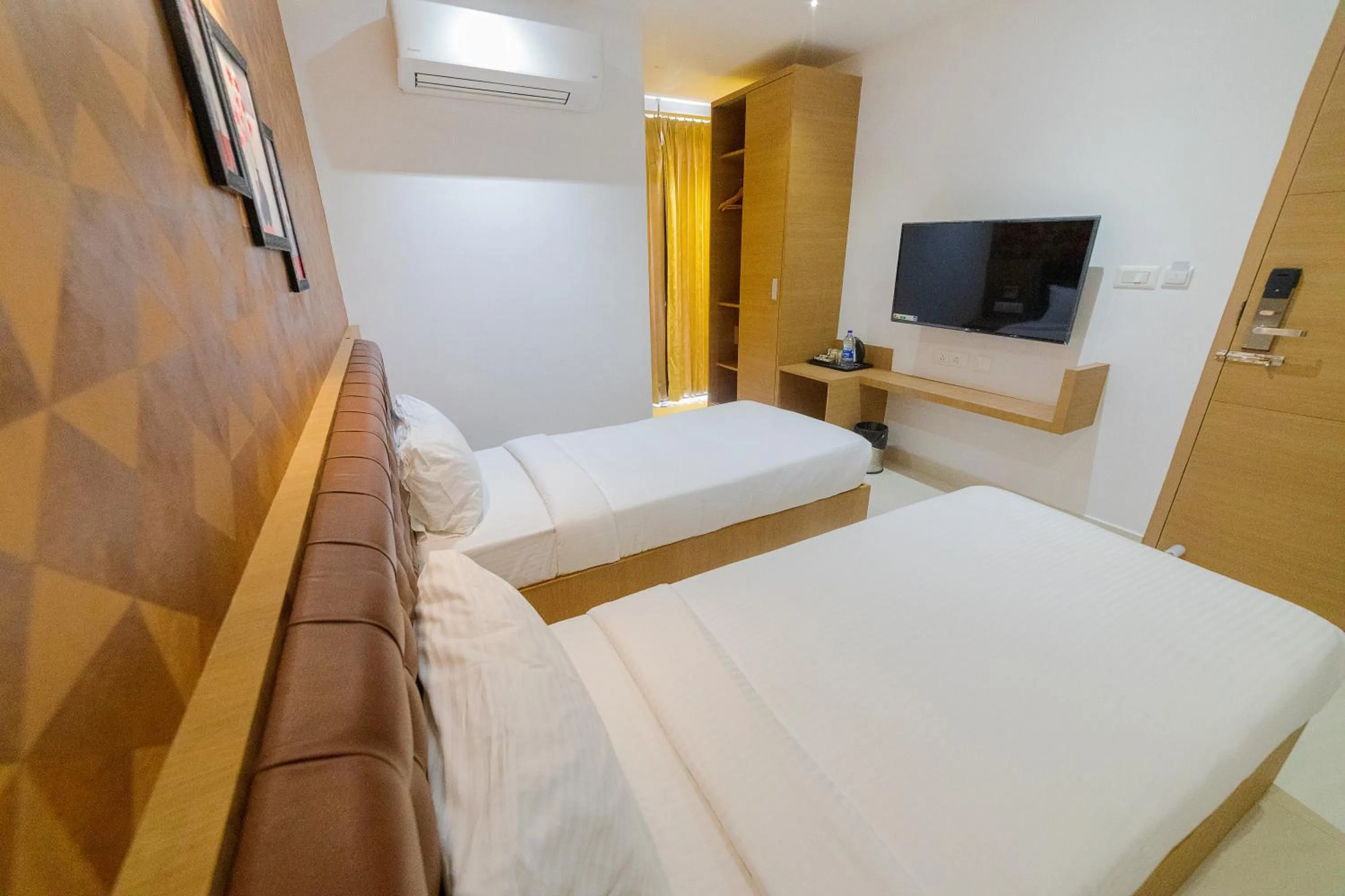 Photo of the whole room, Bed in Sri K residency