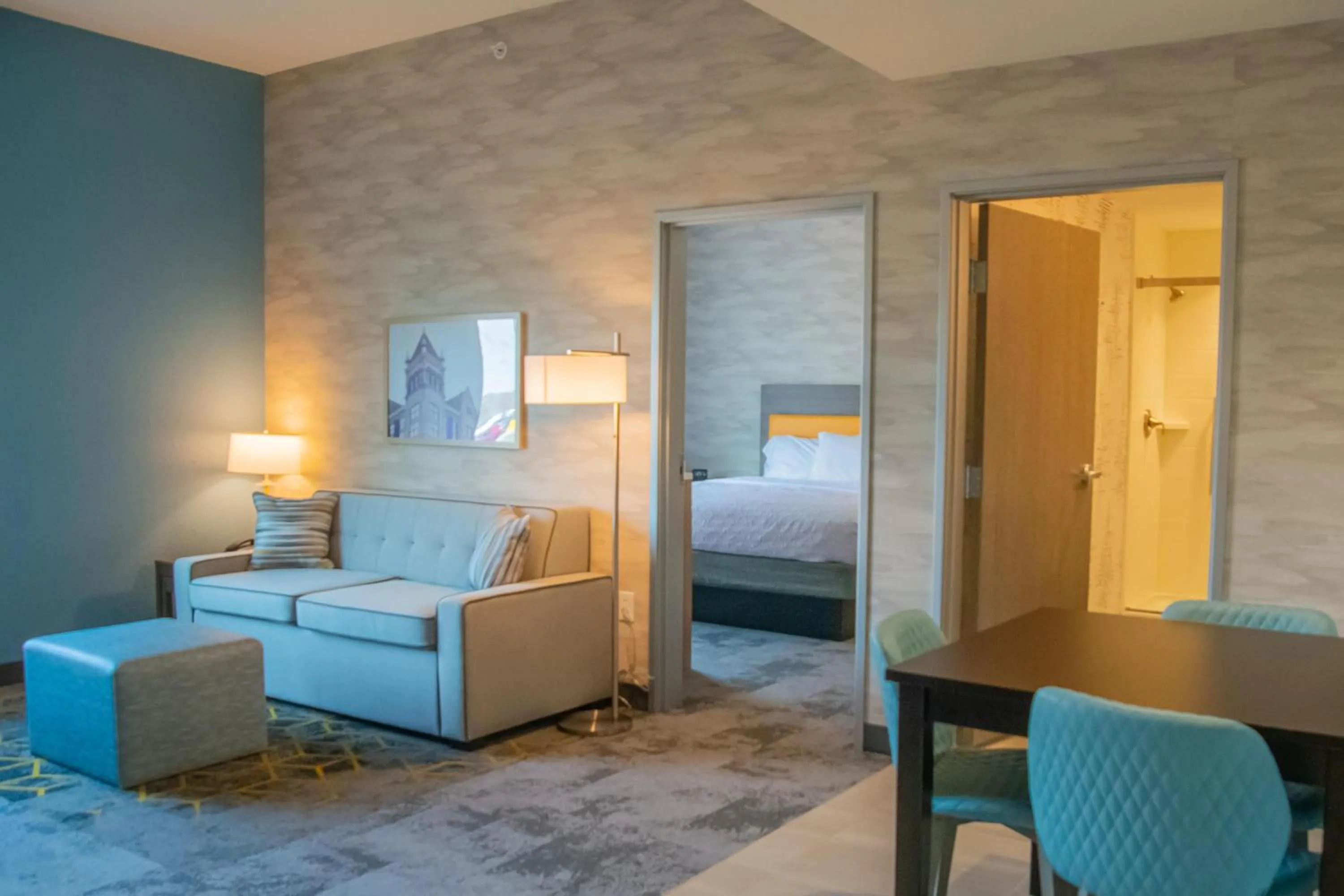 Living room, Bed in Home2 Suites By Hilton Logansport