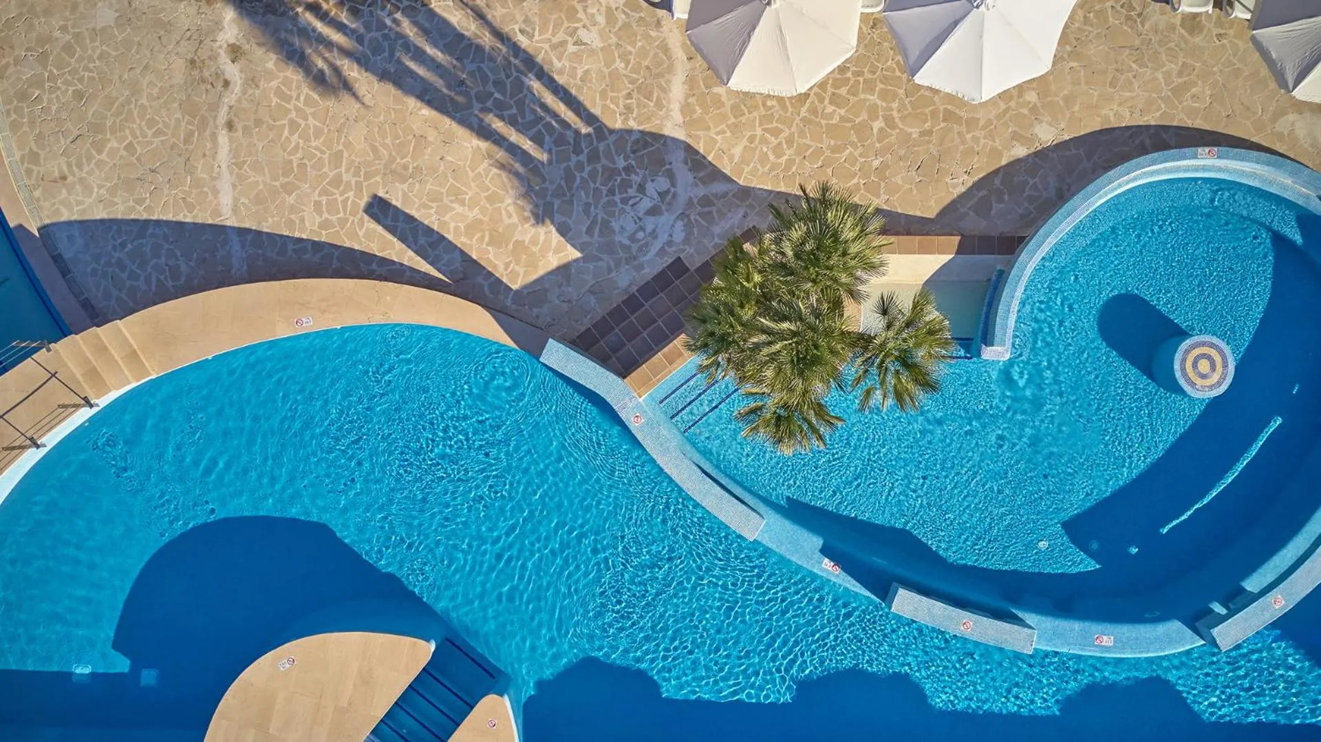 Swimming pool in Pula Suites Boutique Resort