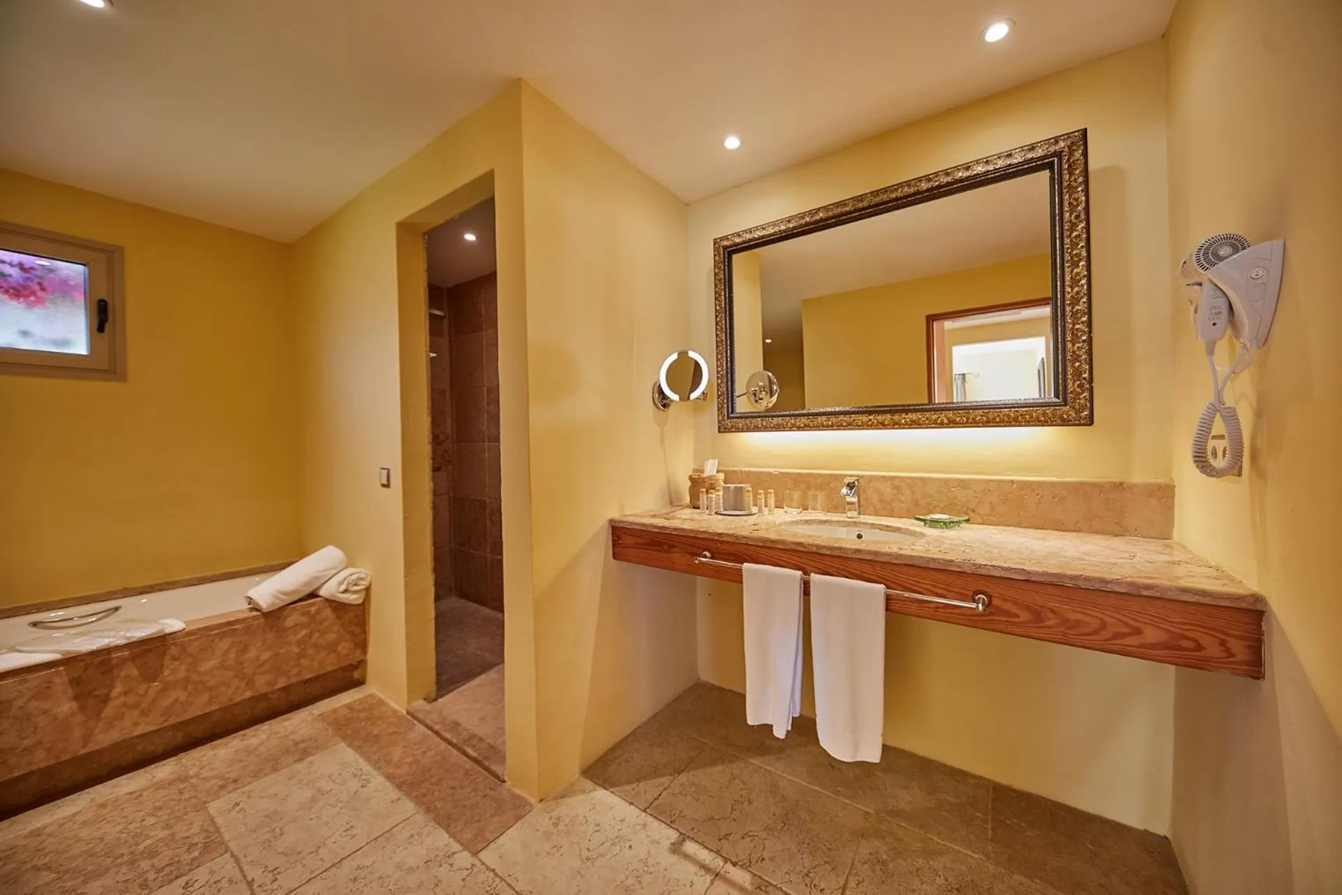 Bathroom, Bed in Pula Suites Boutique Resort
