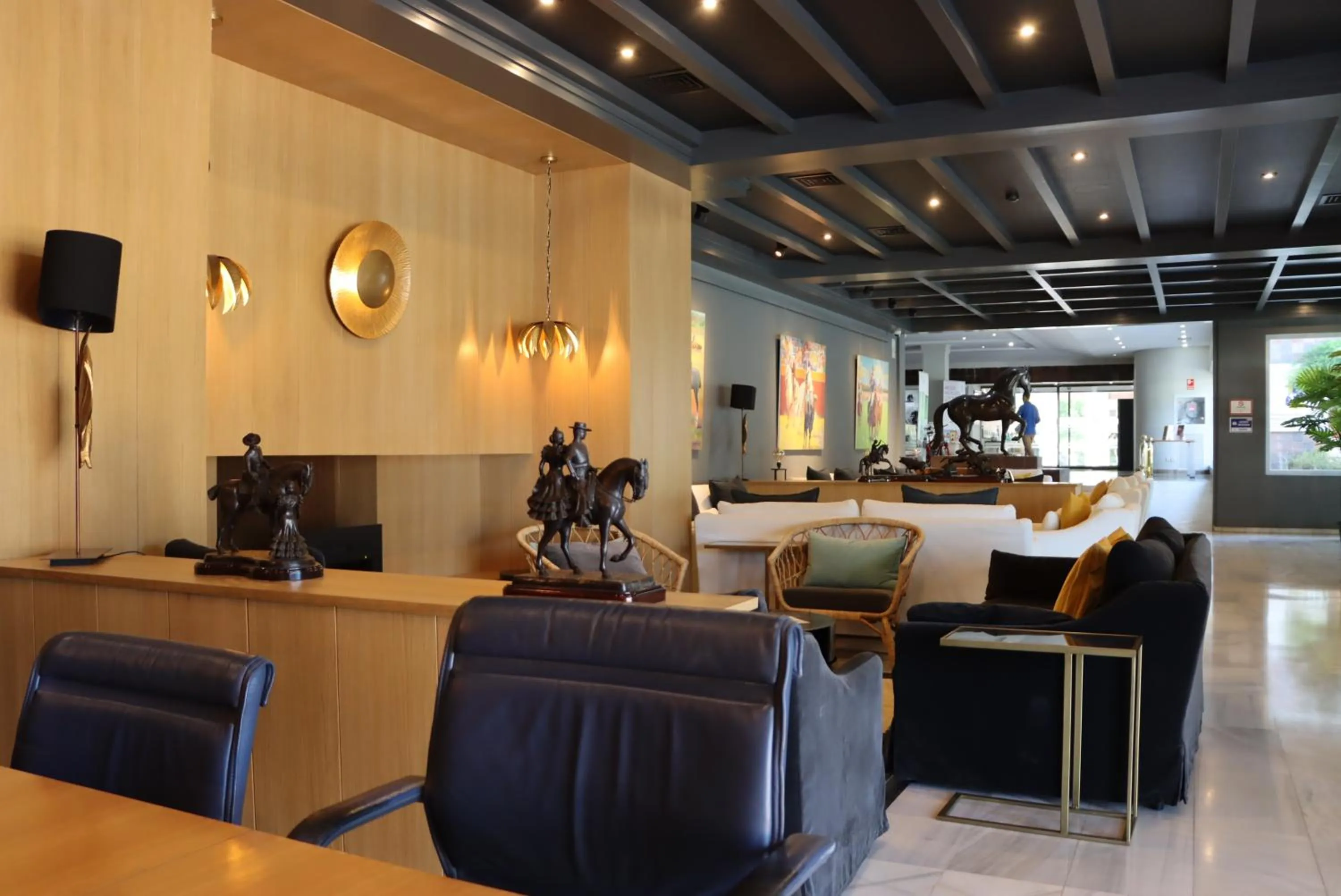 Communal lounge/ TV room in Hotel Jerez & Spa