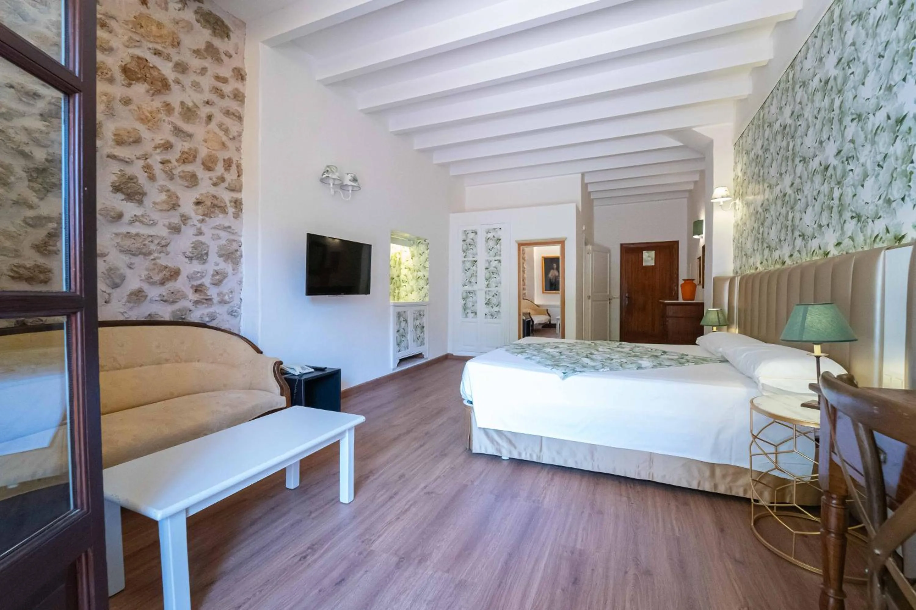 Seating area, Bed in Hotel Rural S'Olivaret & Spa