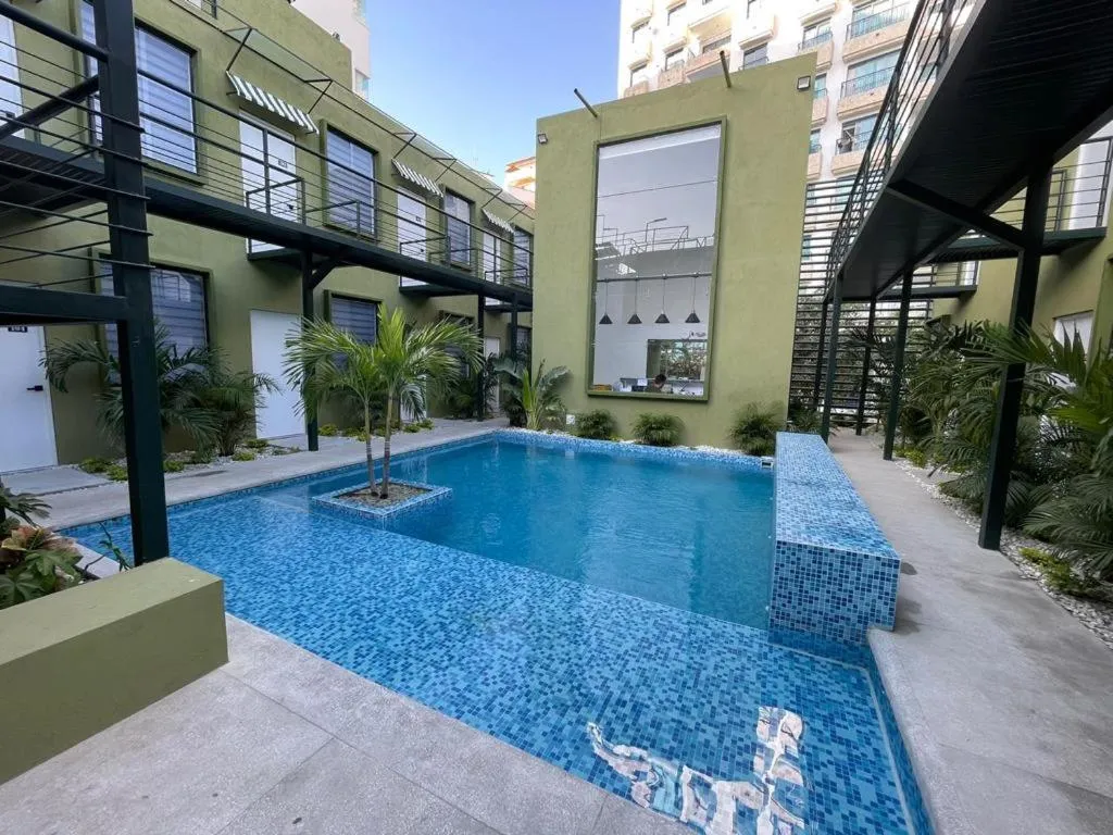 Swimming pool in OASIS TROPICAL HOTEL