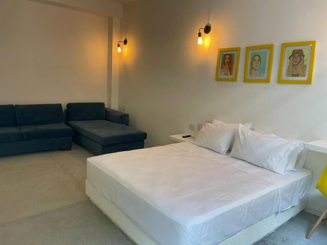 Bed in OASIS TROPICAL HOTEL