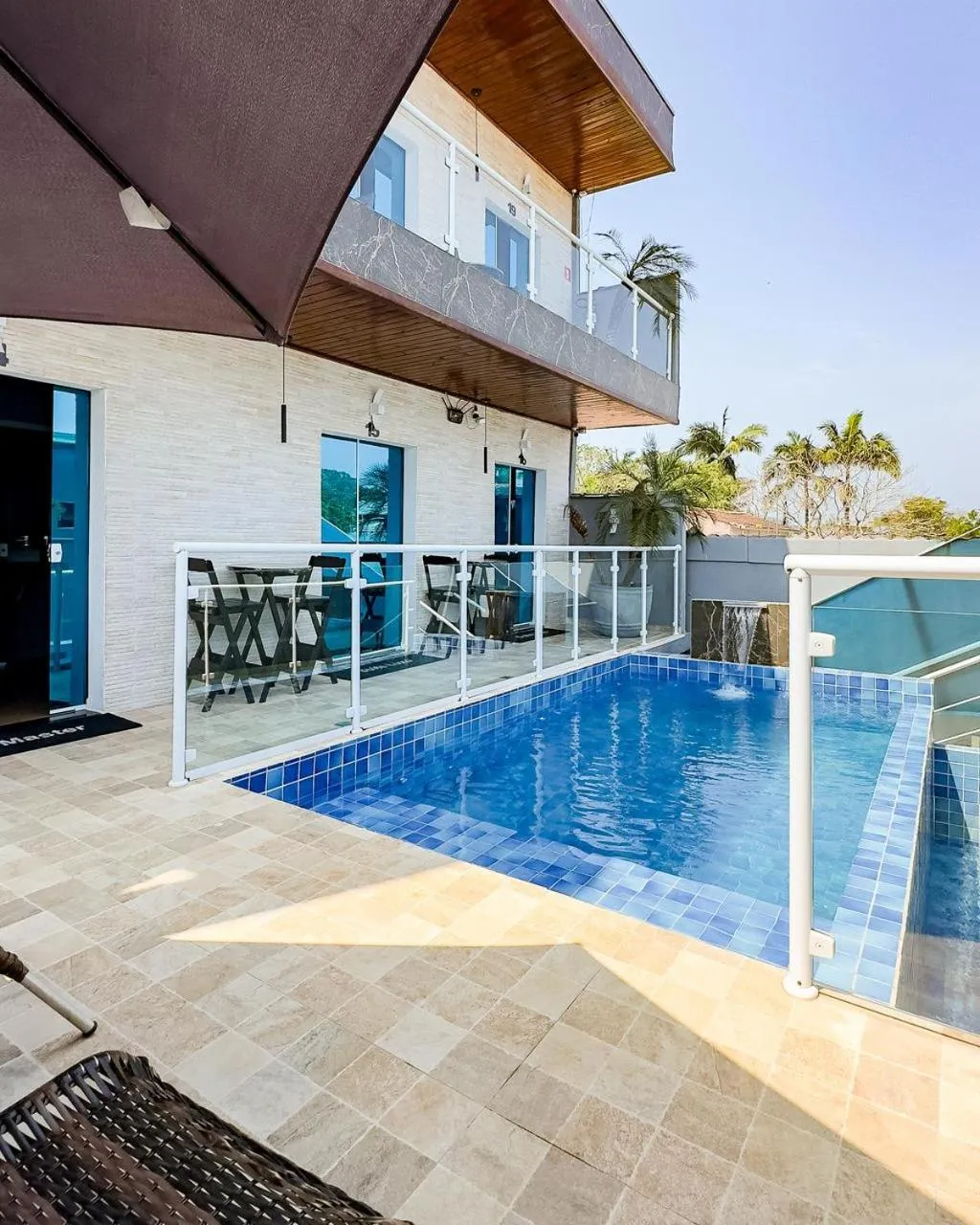 Swimming pool in Pousada Ubatuba