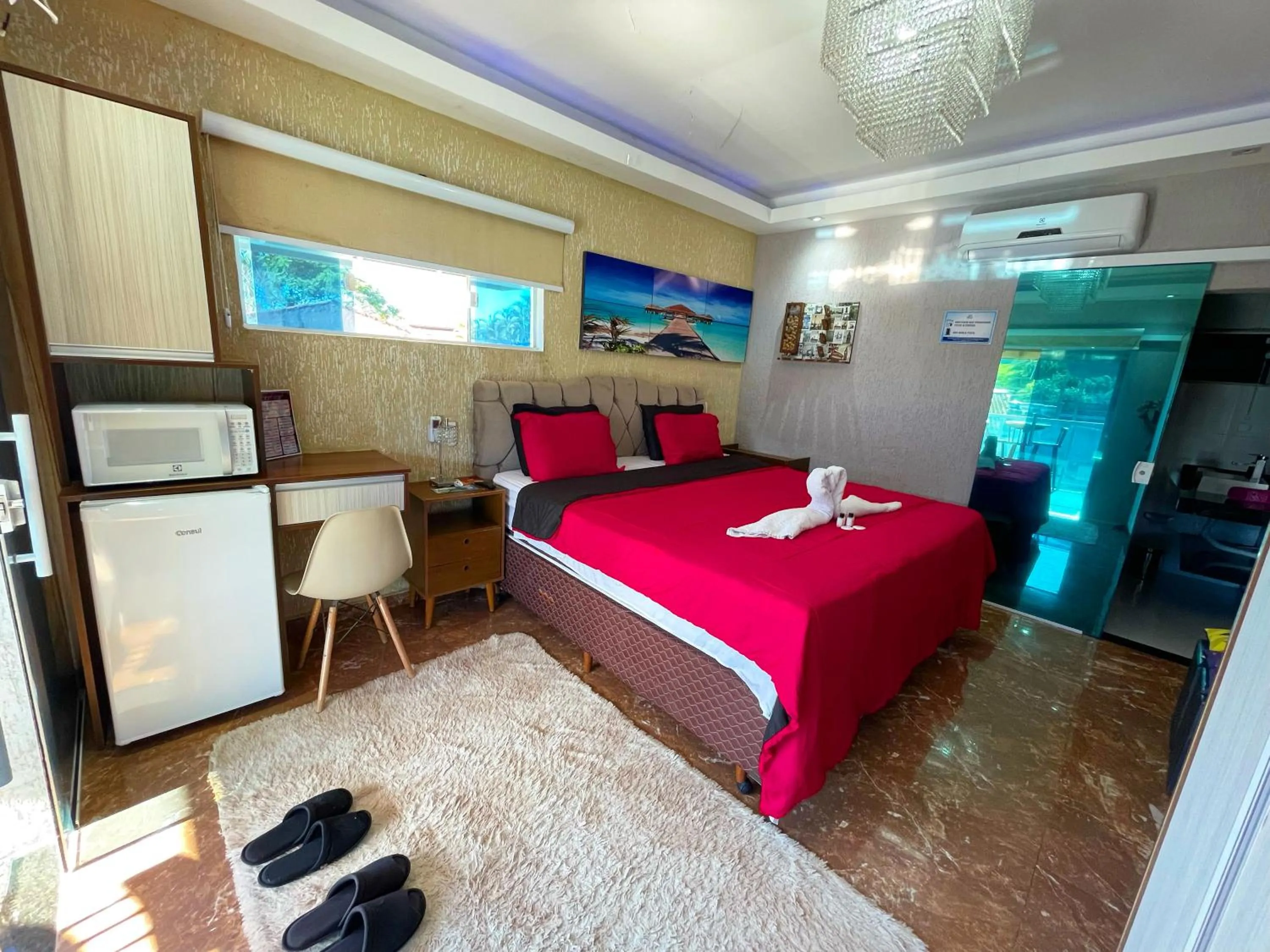 Bed in Pousada Ubatuba