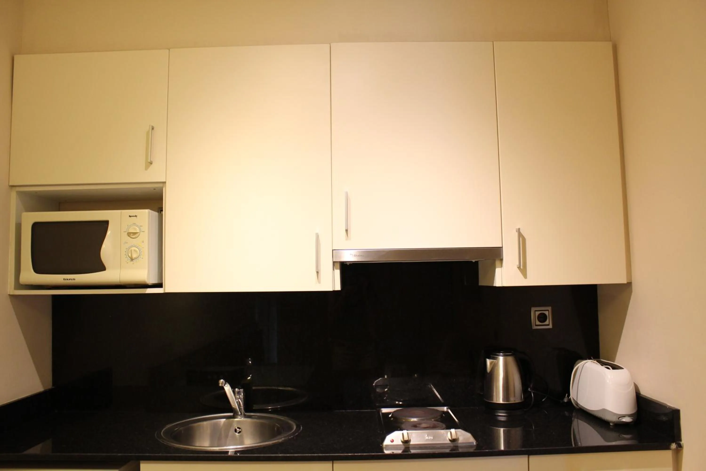 Kitchen or kitchenette in Apartamentos Royal Marina Gardens