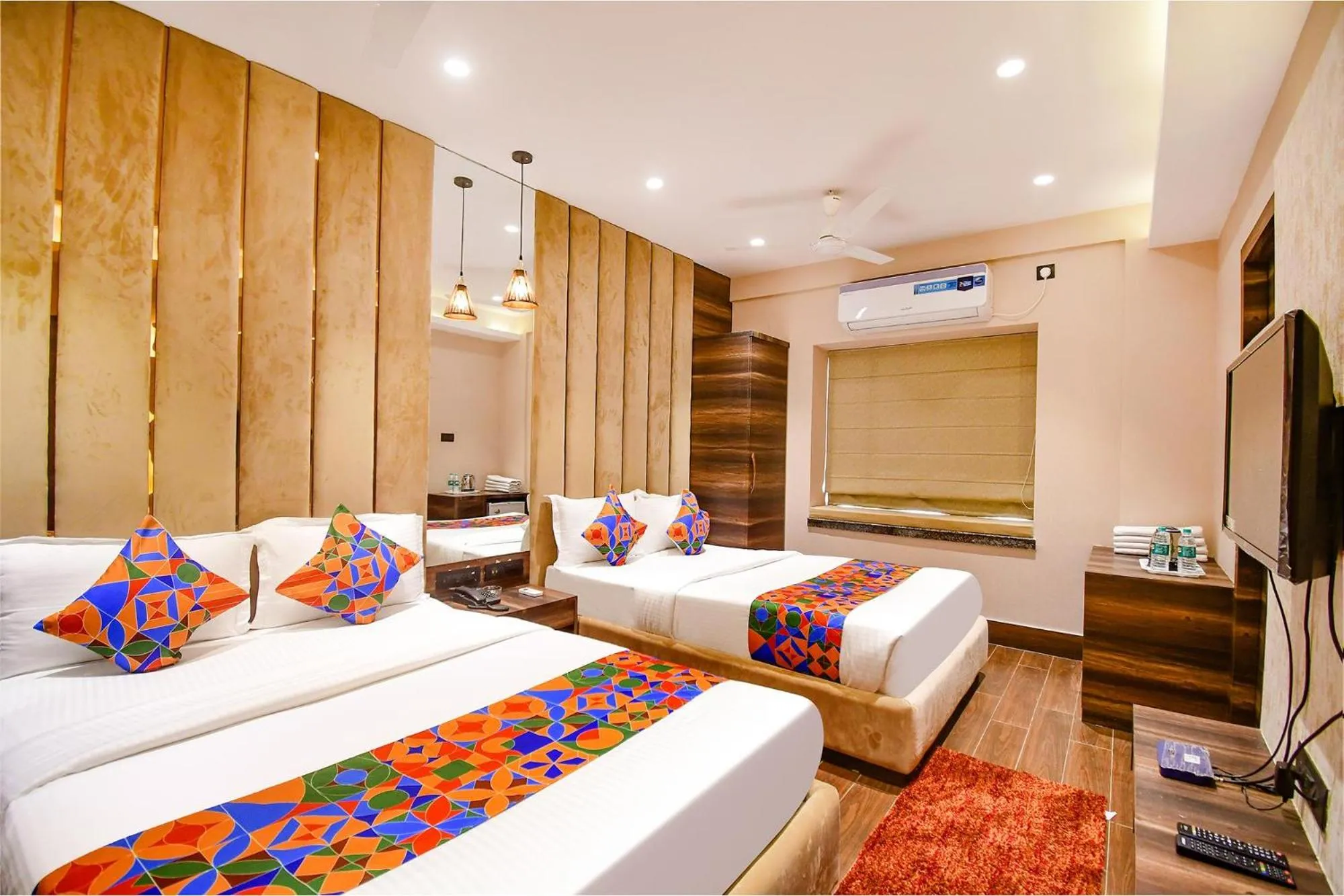 Bed in FabHotel Prime Jalsa - Nr Axis Mall