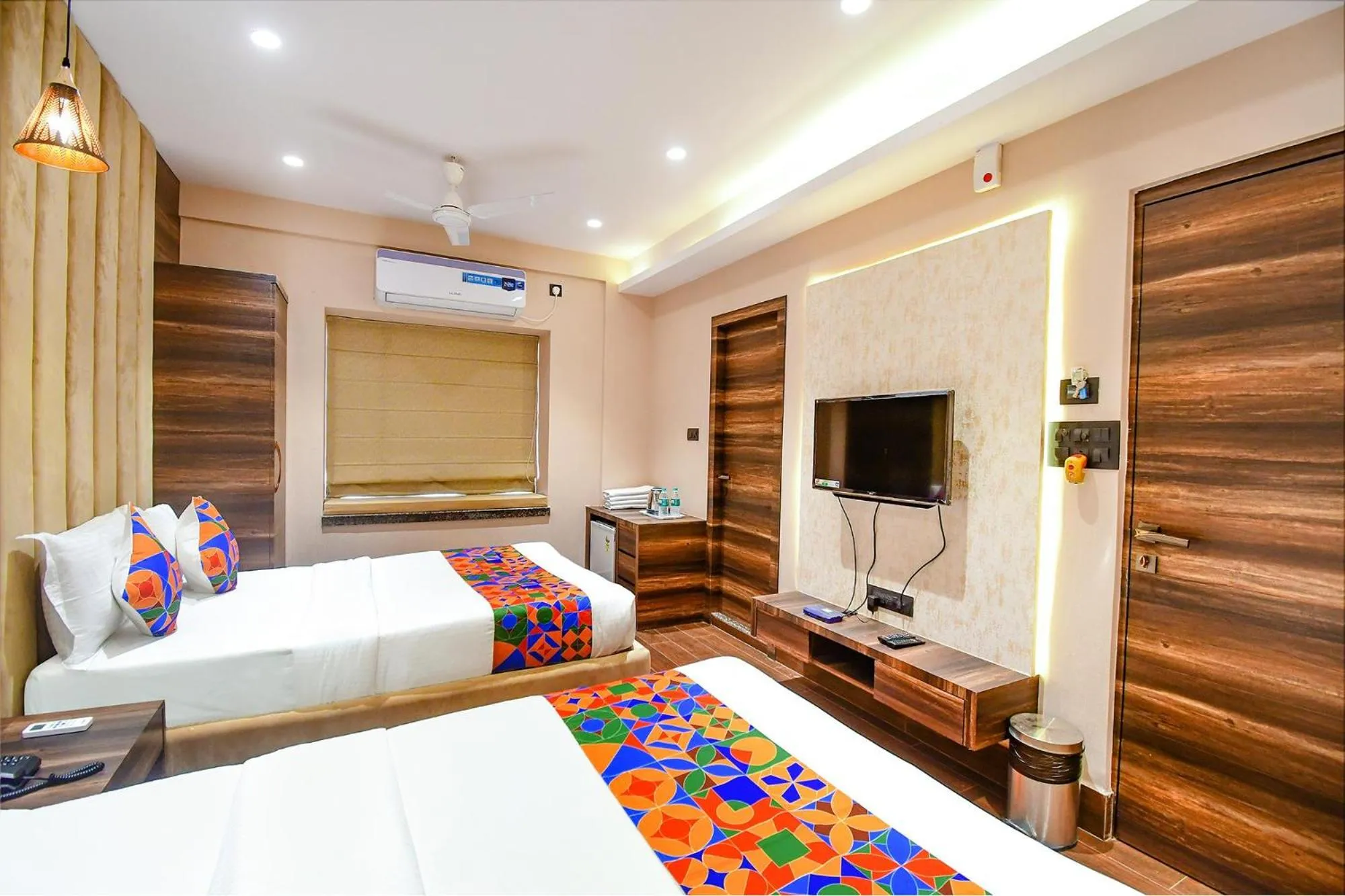 Bed in FabHotel Prime Jalsa - Nr Axis Mall