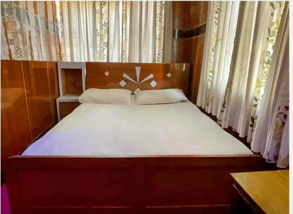 Bed in Sudha’s Garden Home