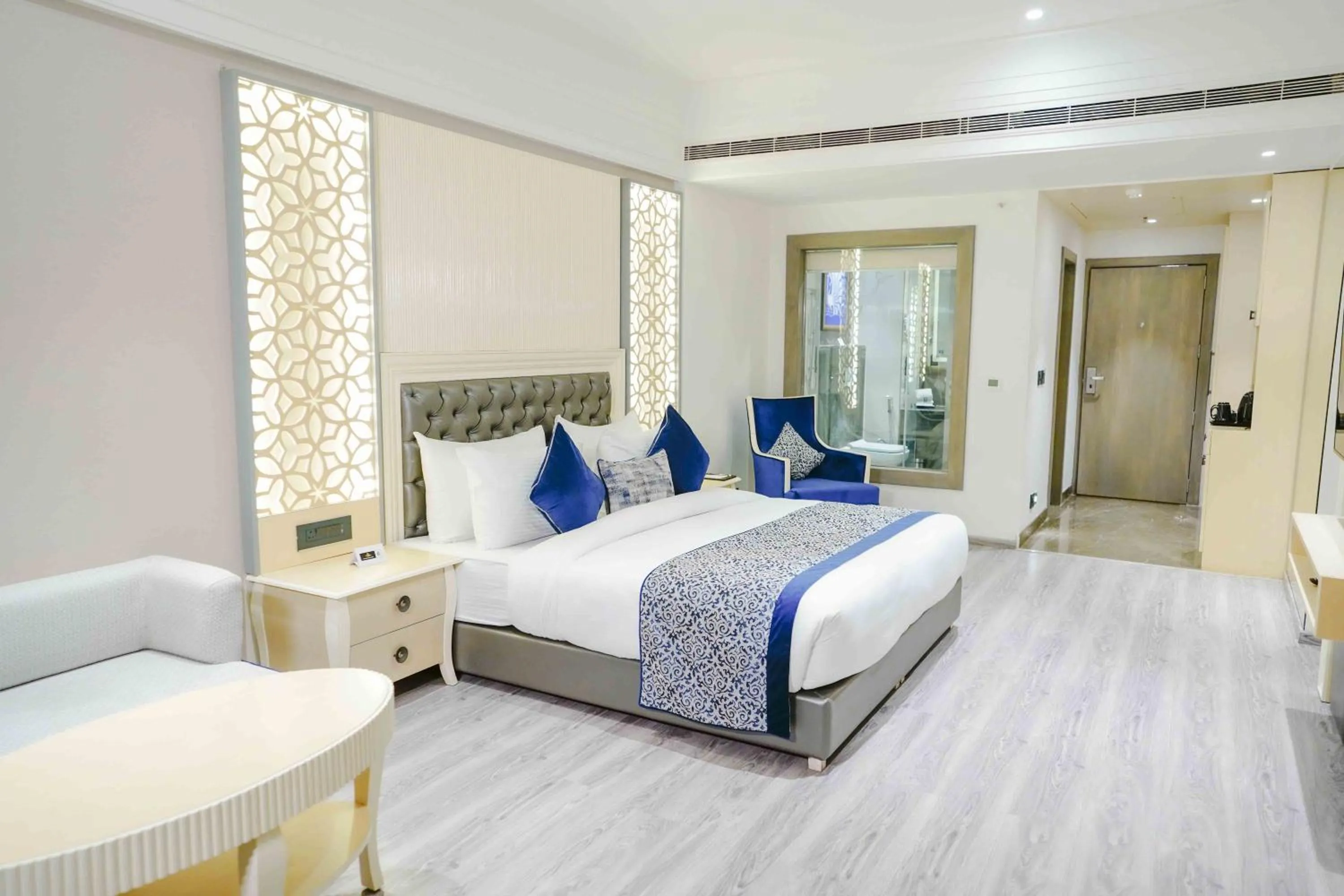 Bed in The Grand Nirvana Hotel