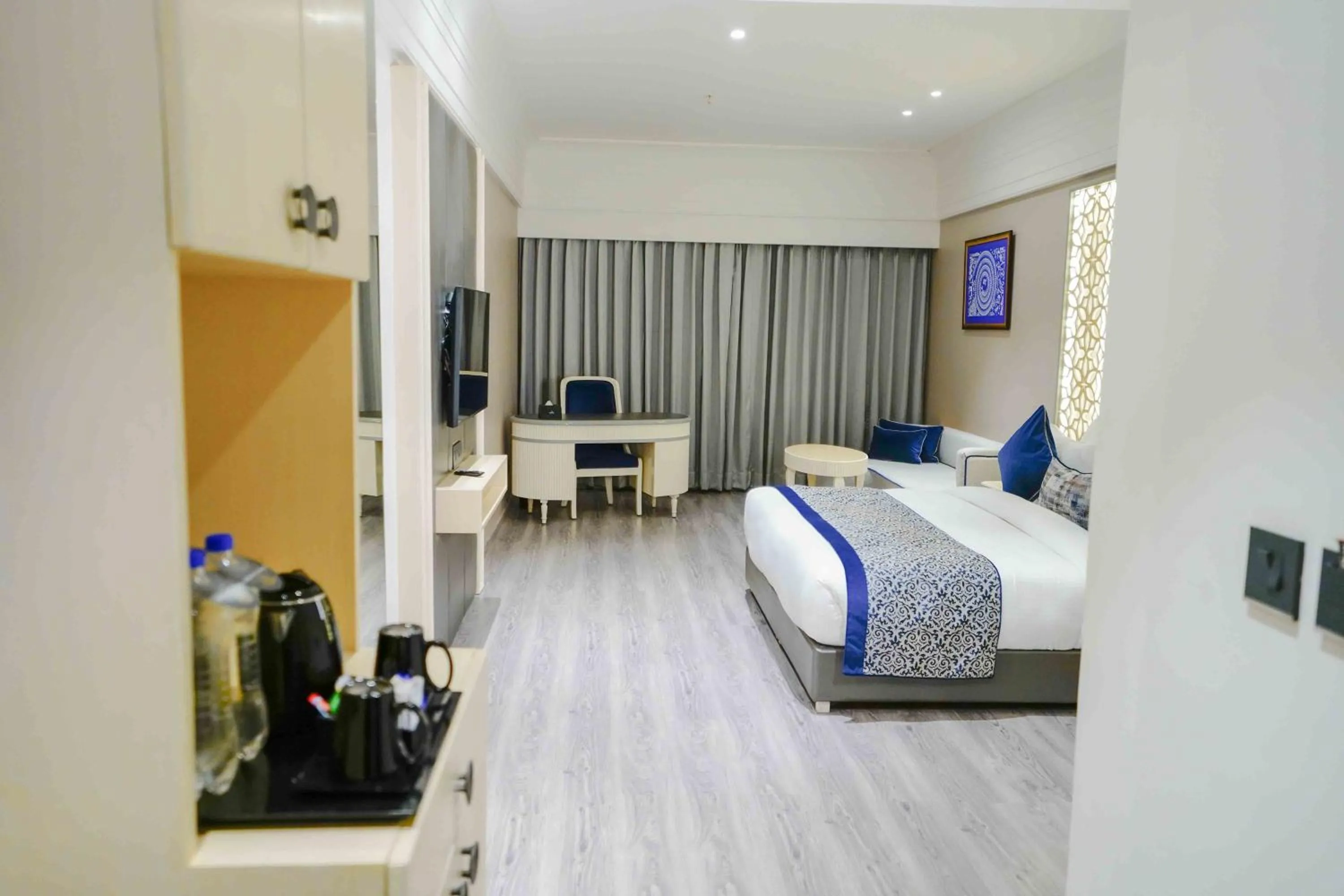 Bed in The Grand Nirvana Hotel