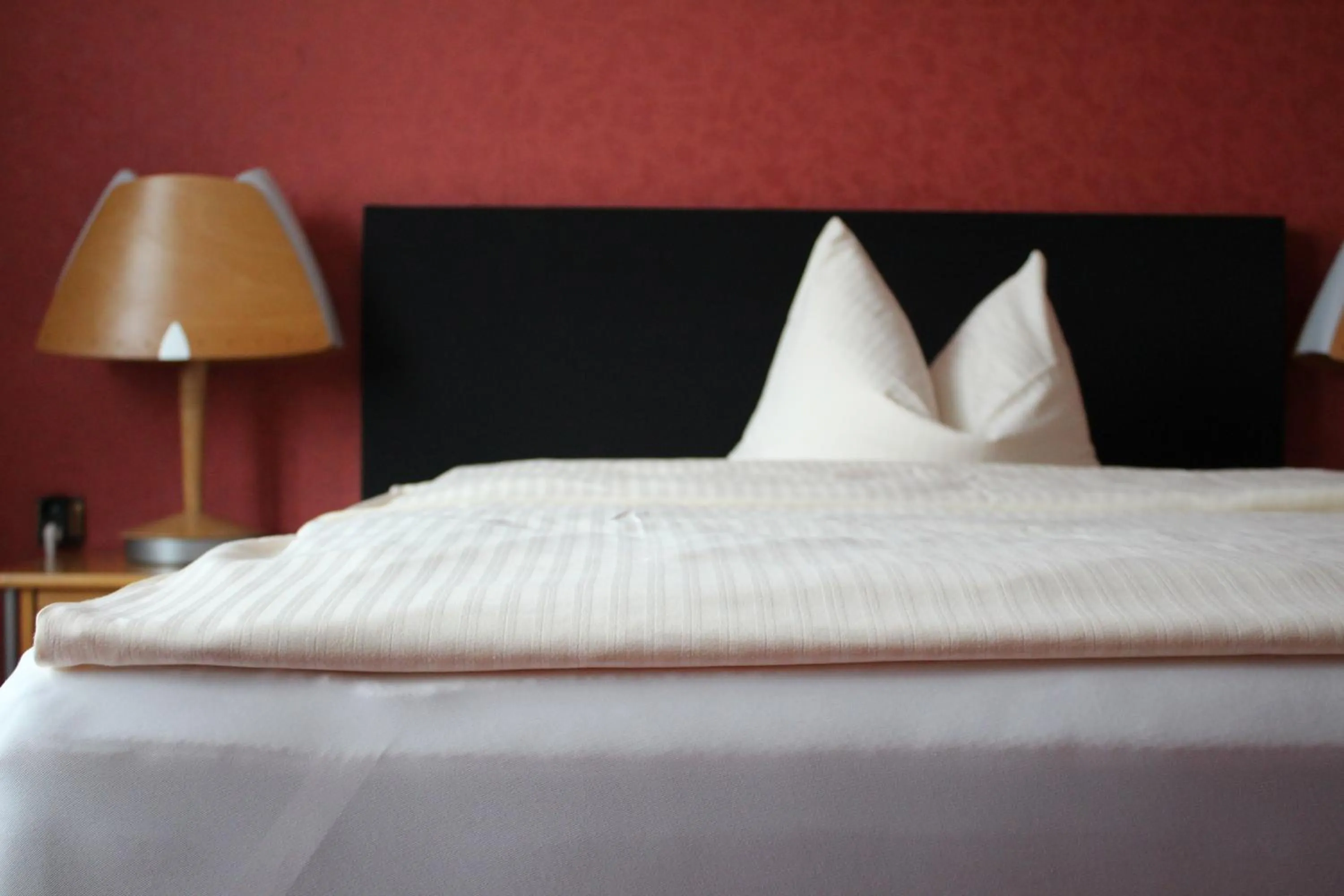 Bed in Occhipinti Passione - Restaurant & Hotel - Weyhausen