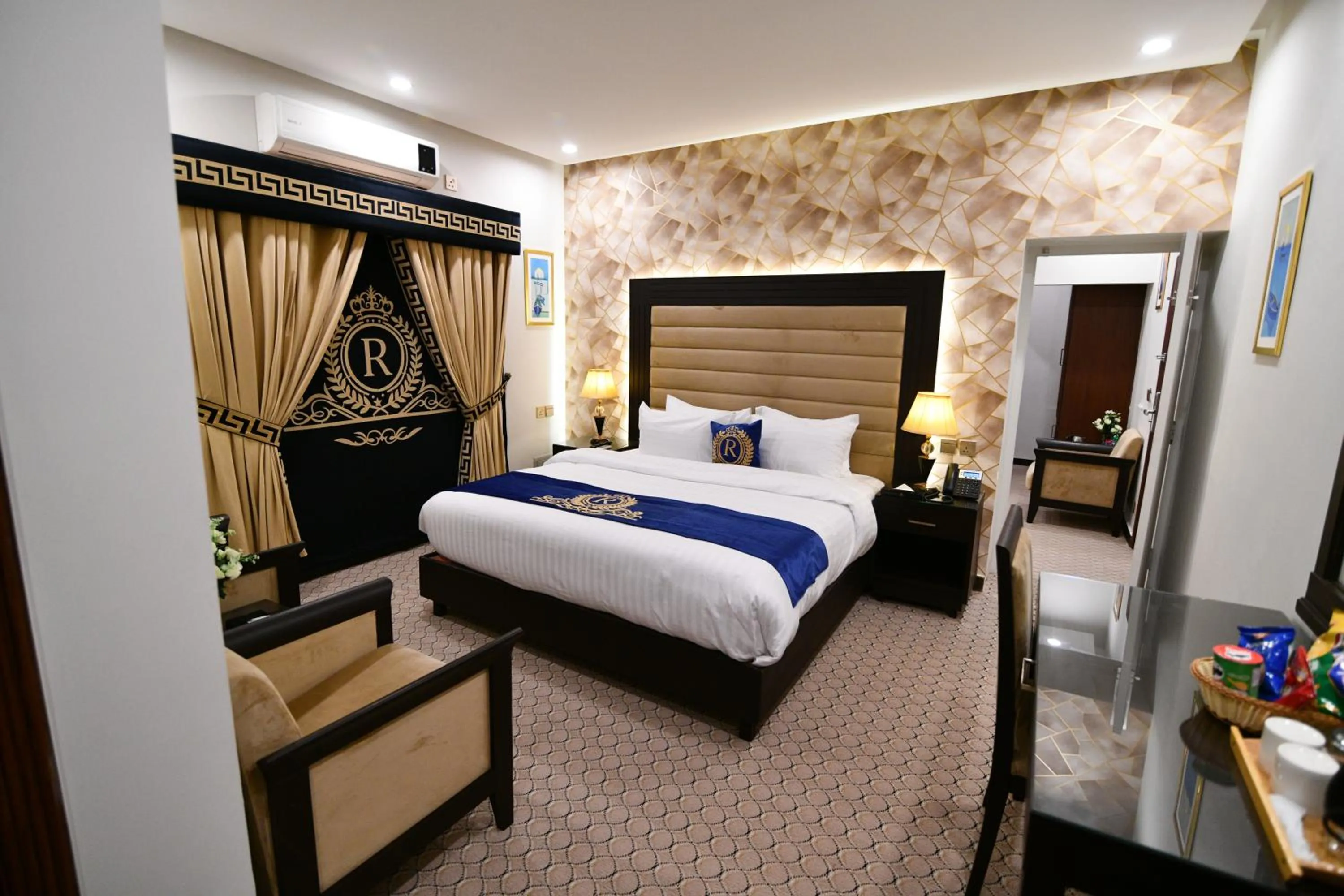 Bed in Royal Regency Hotel
