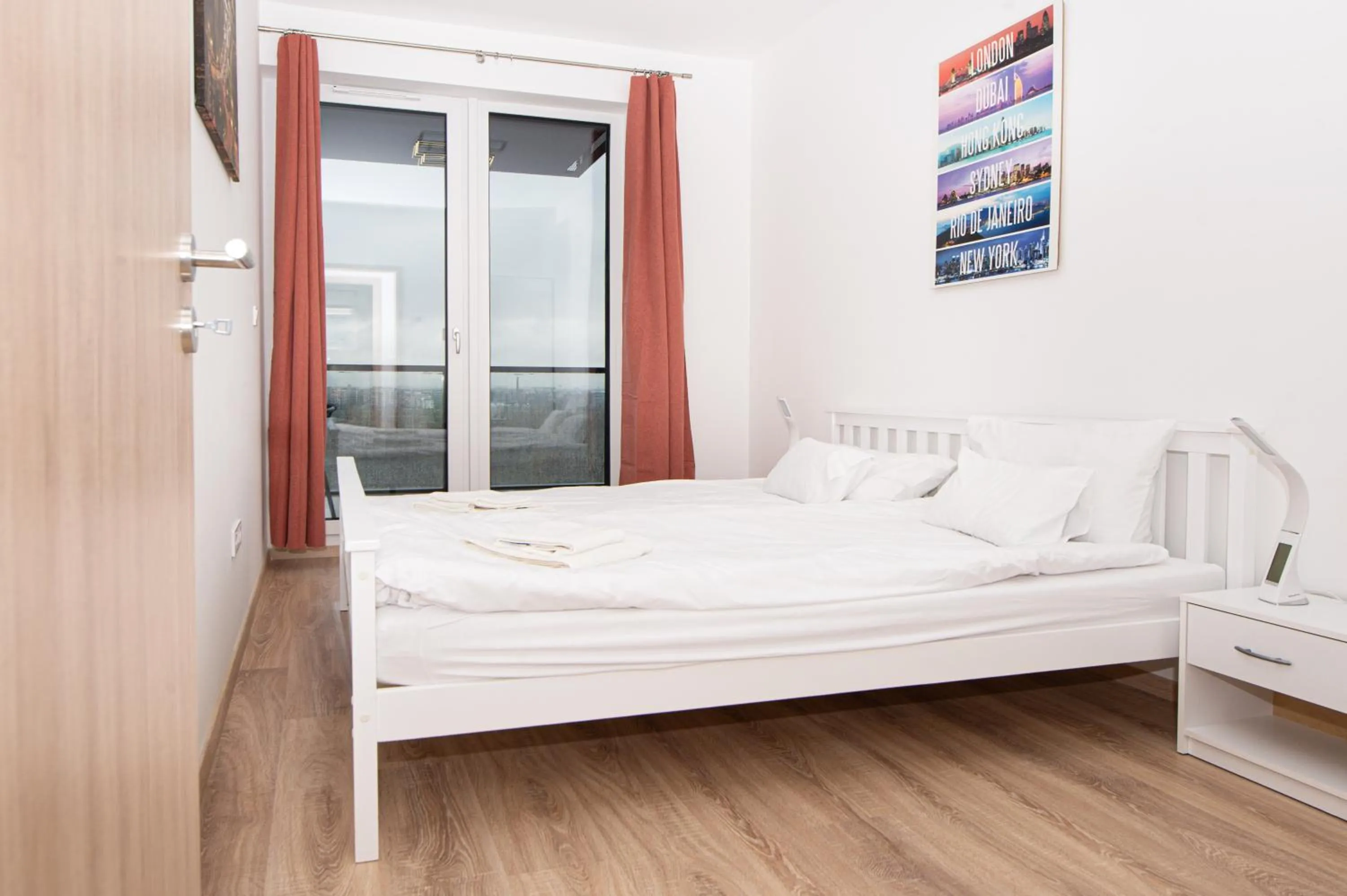 Bed in WaterFront City Apartments by FirstHost