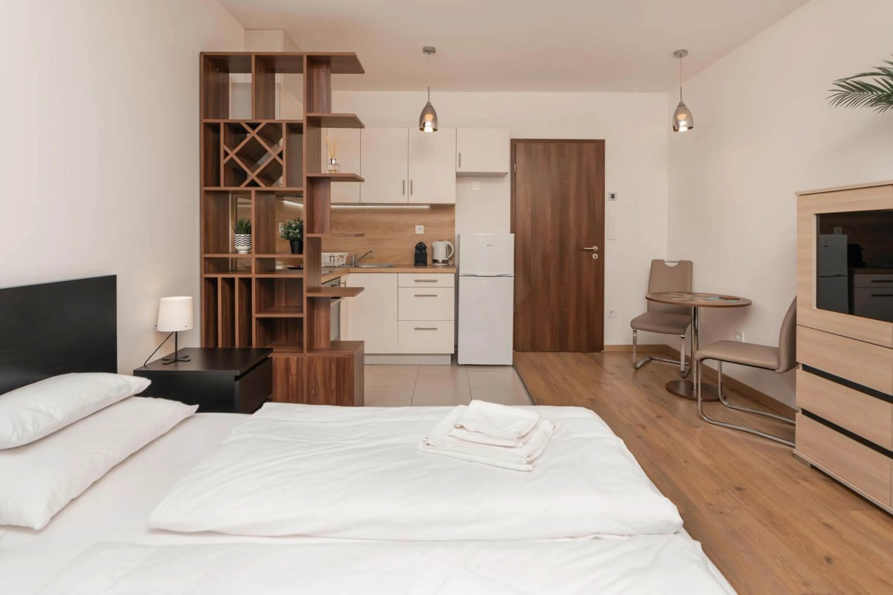 Bed in WaterFront City Apartments by FirstHost