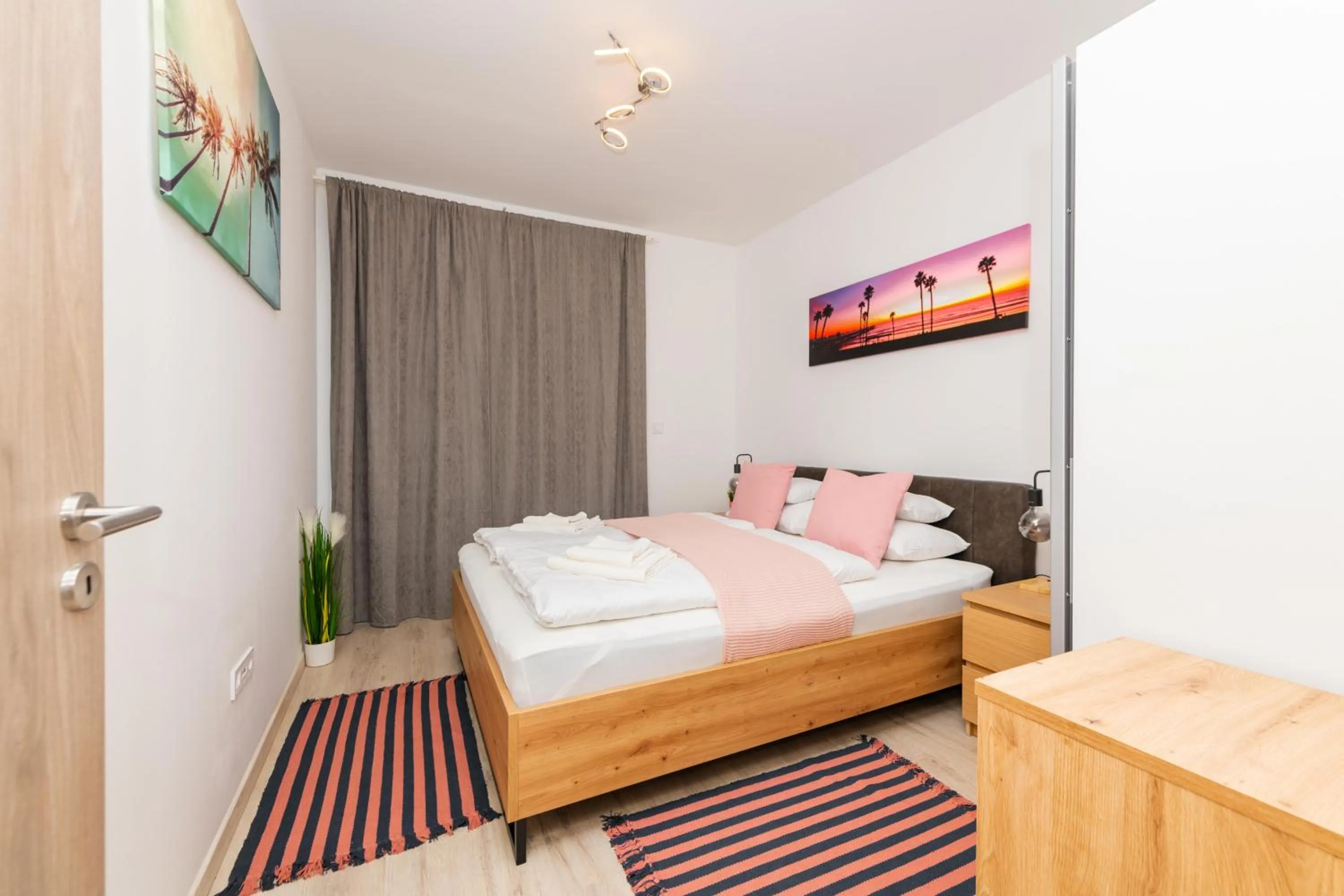 Bed in WaterFront City Apartments by FirstHost