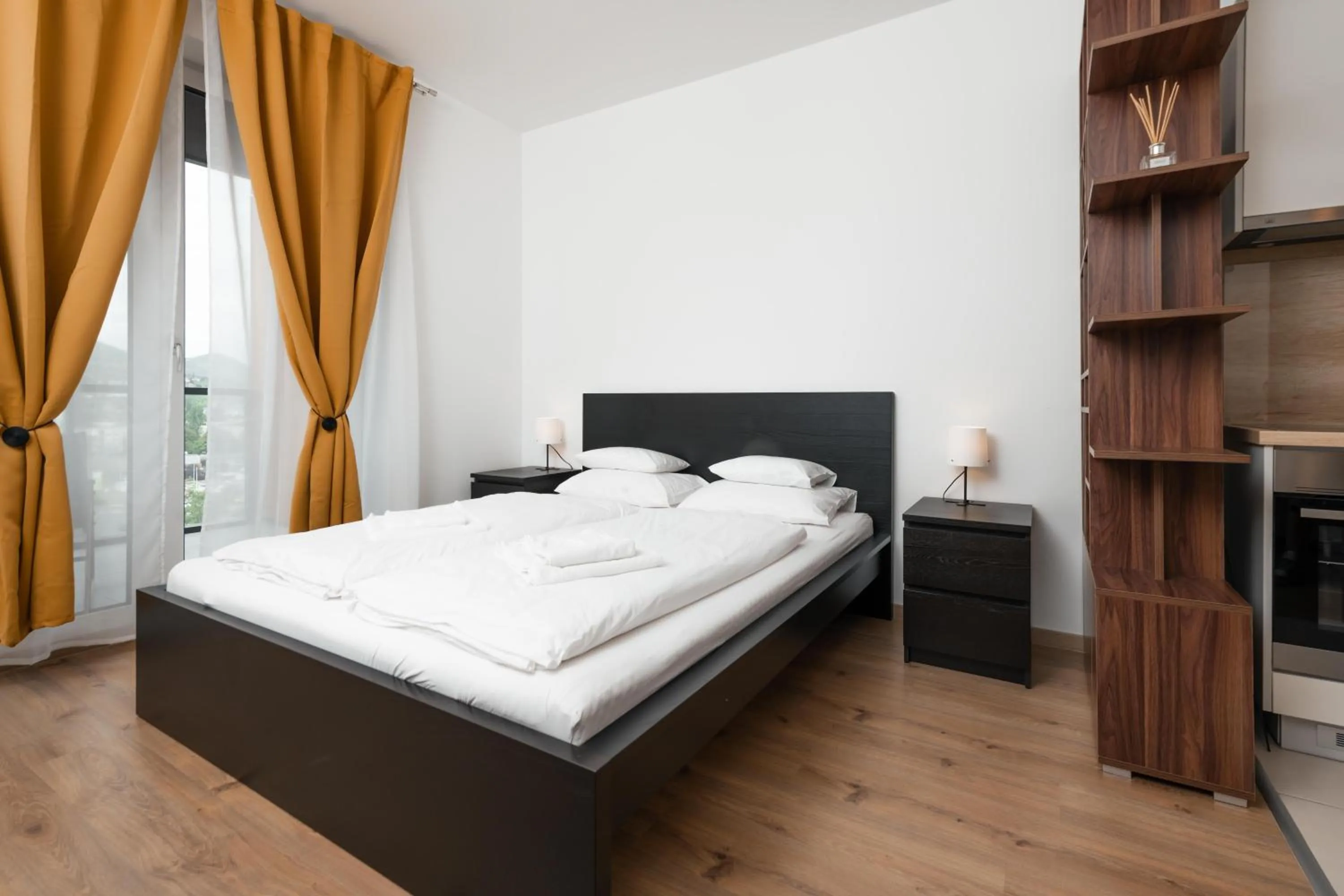 Bed in WaterFront City Apartments by FirstHost