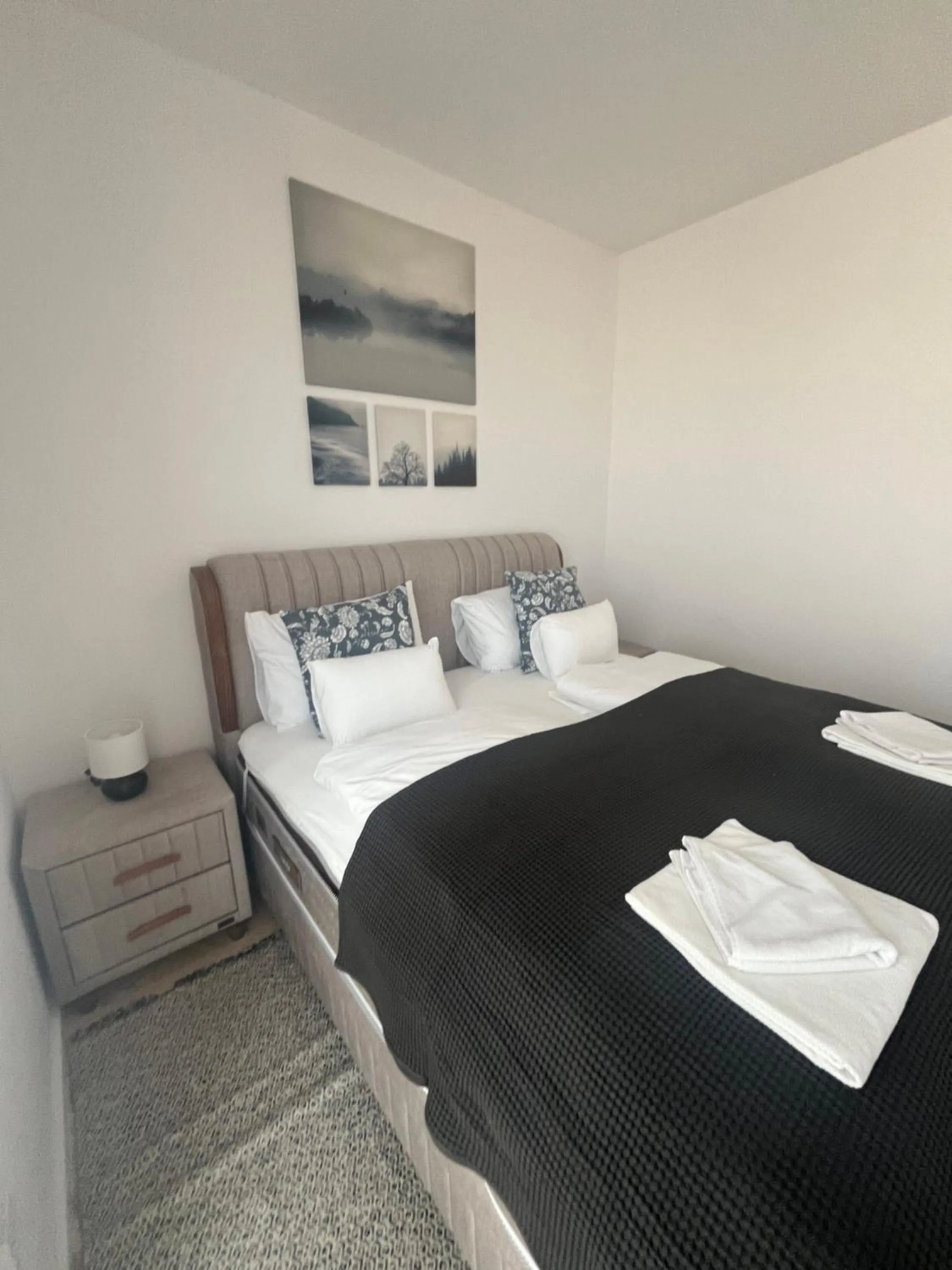 Bed in WaterFront City Apartments by FirstHost