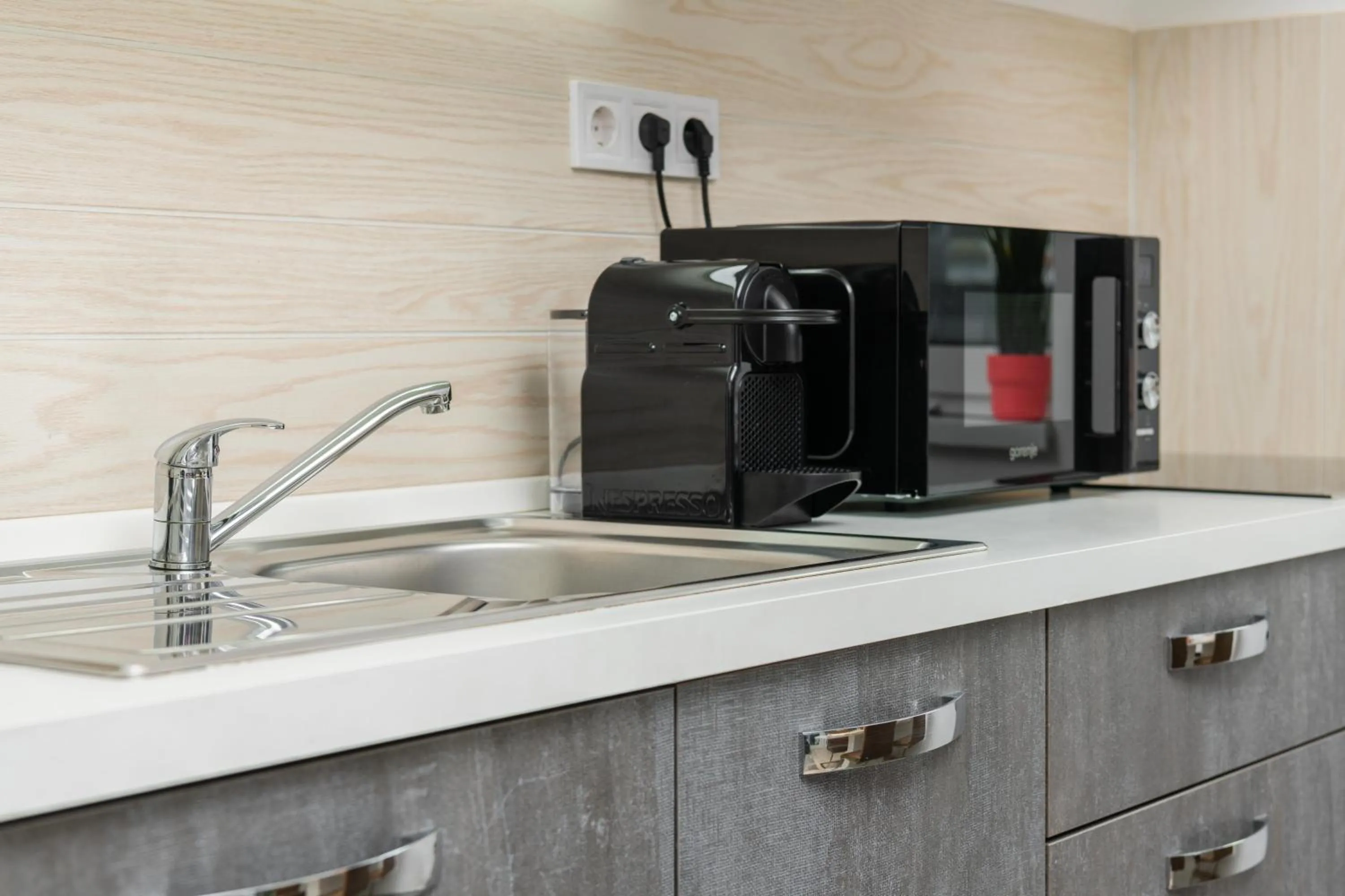 Coffee/tea facilities in WaterFront City Apartments by FirstHost