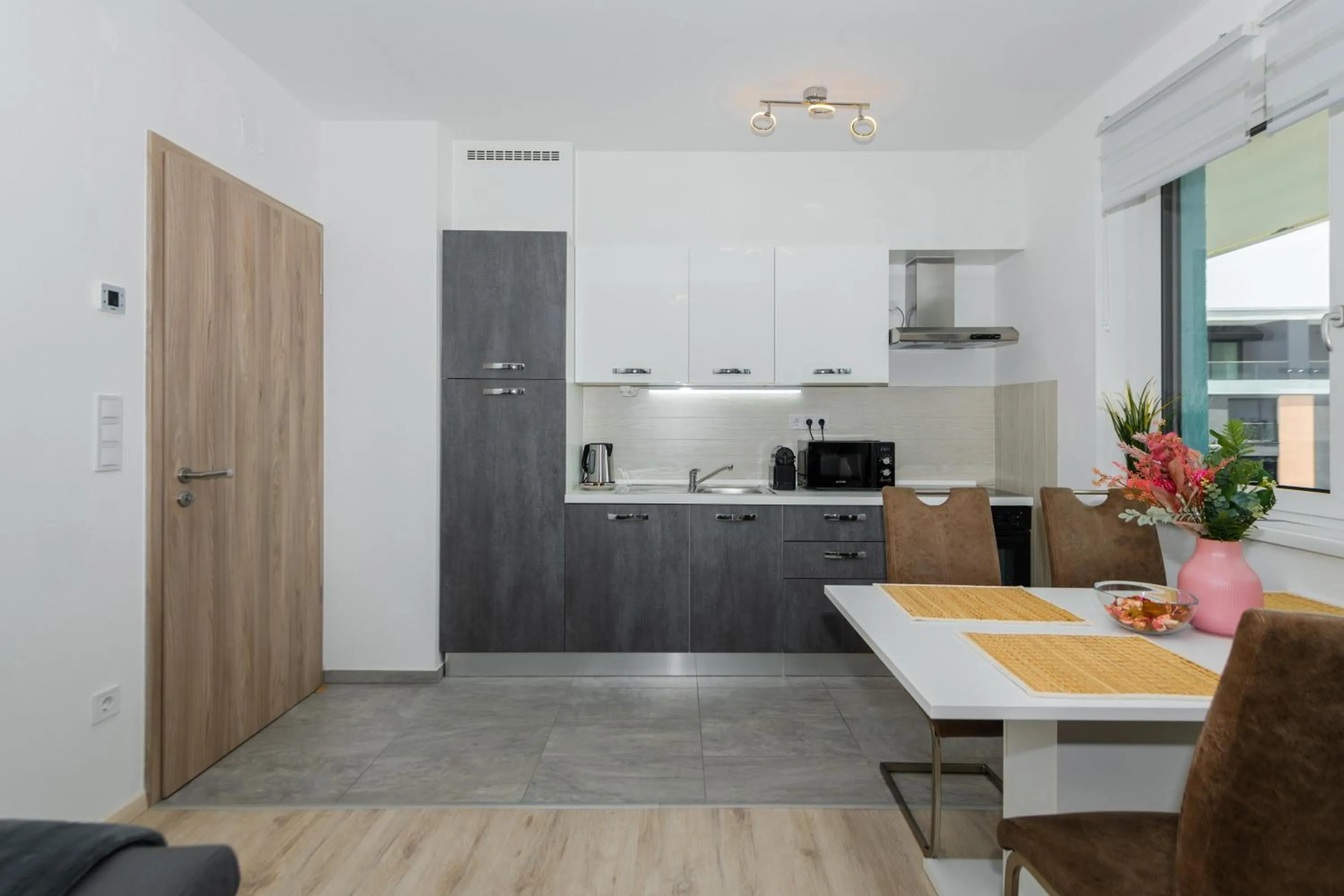 Coffee/tea facilities in WaterFront City Apartments by FirstHost