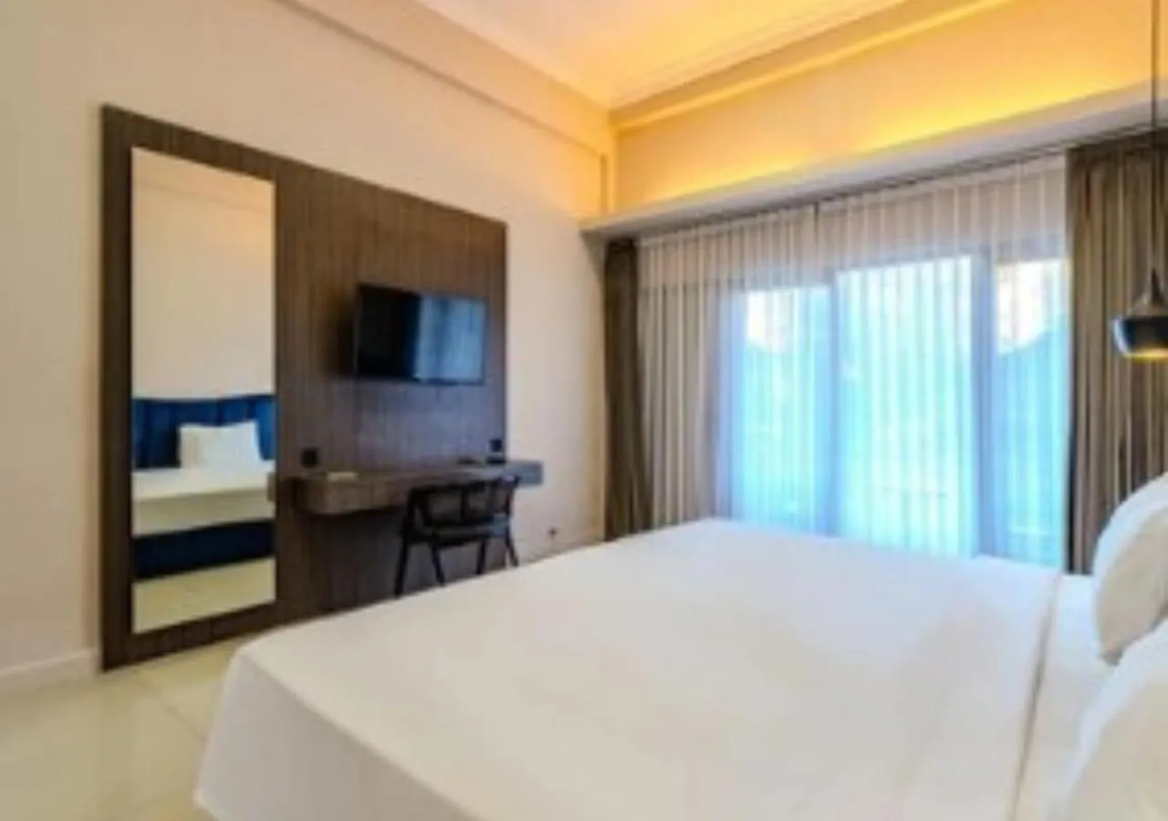 Communal lounge/ TV room, Bed in Marine Bay Sanur