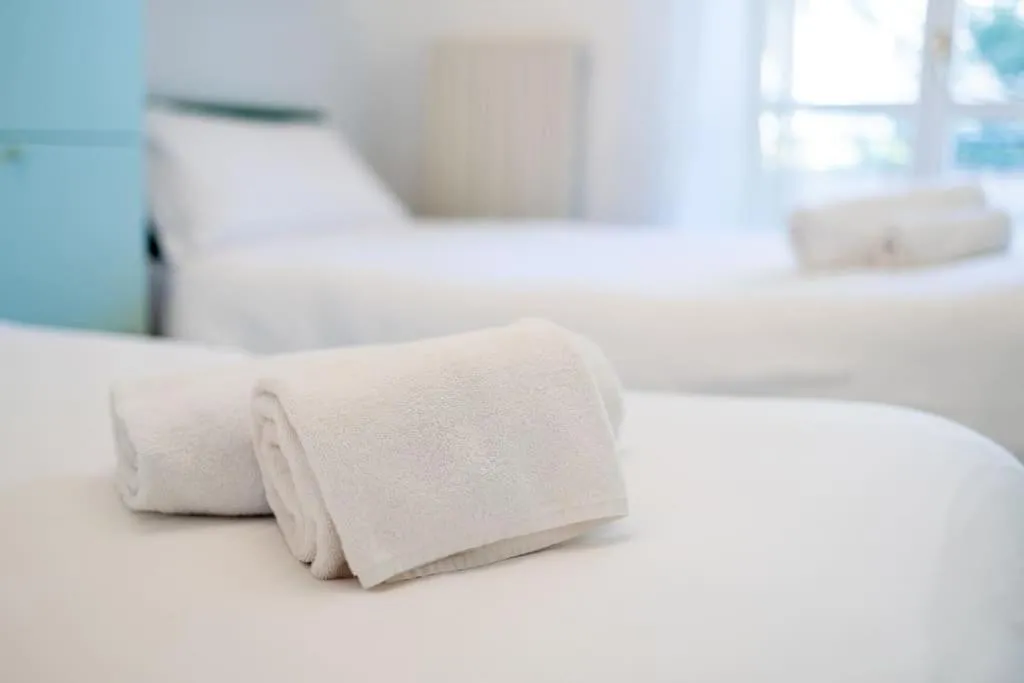 Bed in Victoria Hall Bordighera - 2 bedroom apartment - Parking