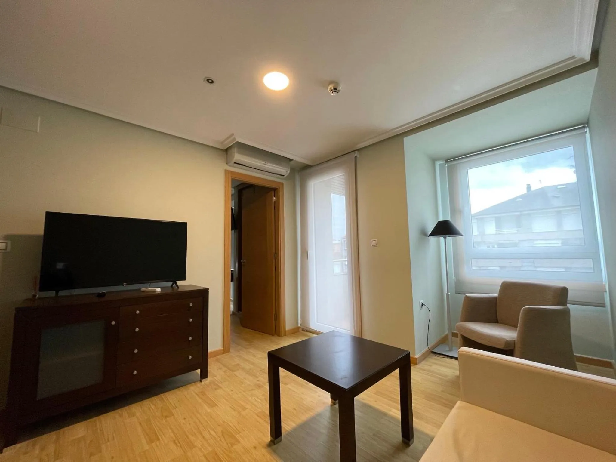 Living room in Aparthotel Arenteiro