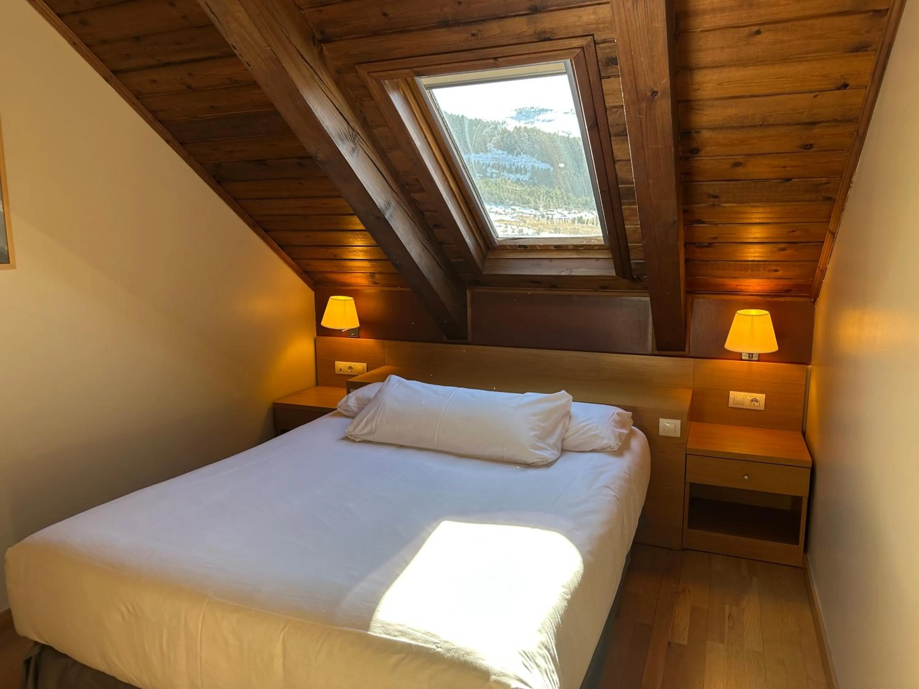 Bed in Aparthotel Siente Boí & SPA