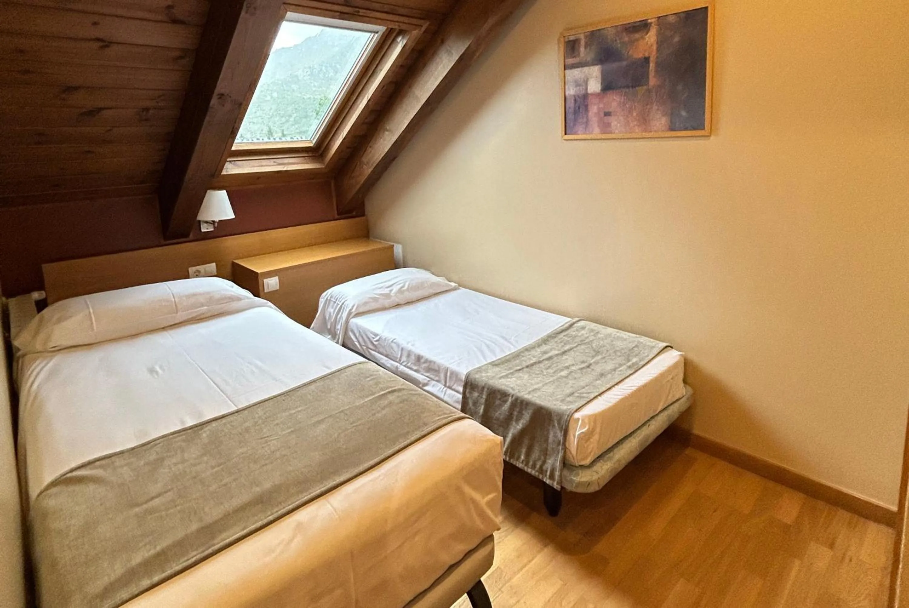 Bedroom, Bed in Aparthotel Siente Boí & SPA