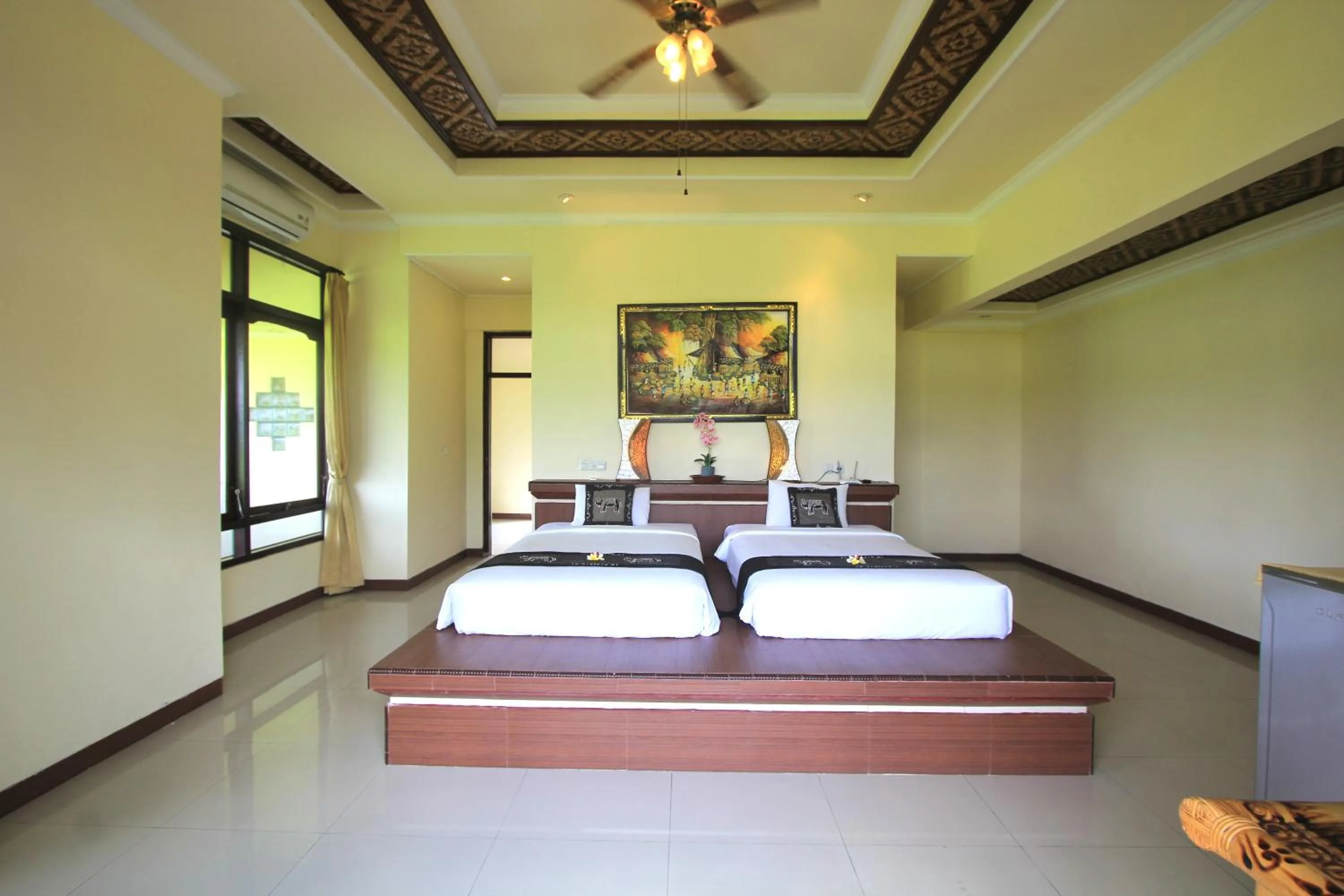 Bed in SUARA SIDHI Villa Ubud Bali