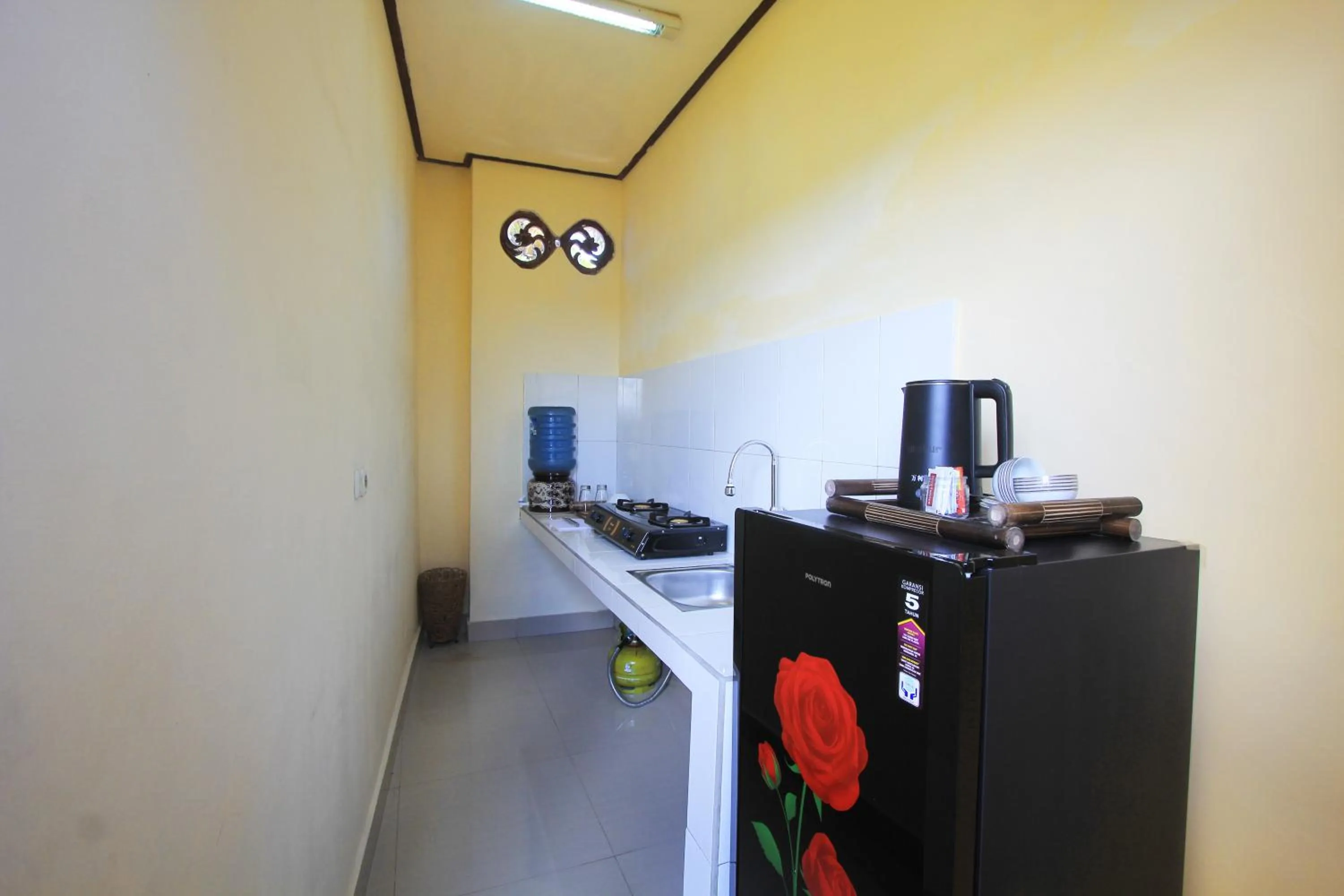 Kitchen or kitchenette in SUARA SIDHI Villa Ubud Bali
