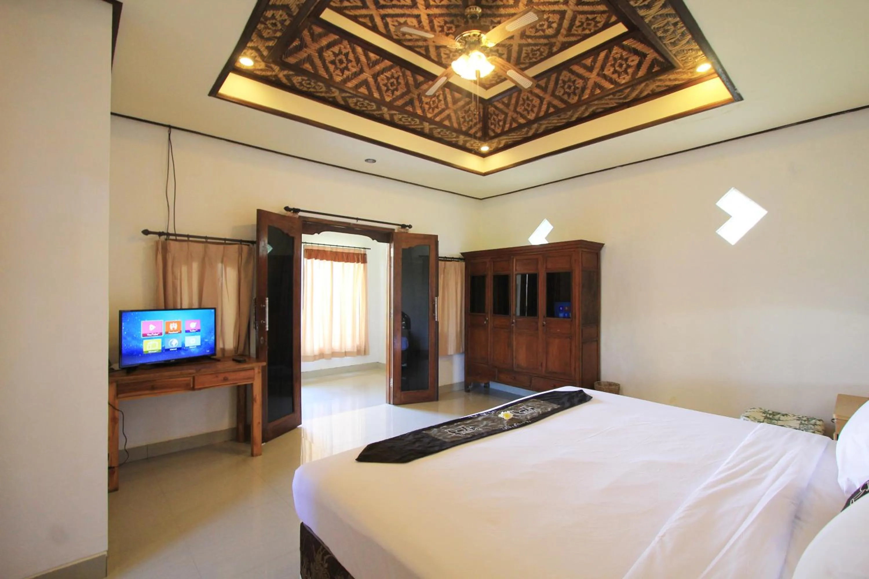 Bed in SUARA SIDHI Villa Ubud Bali