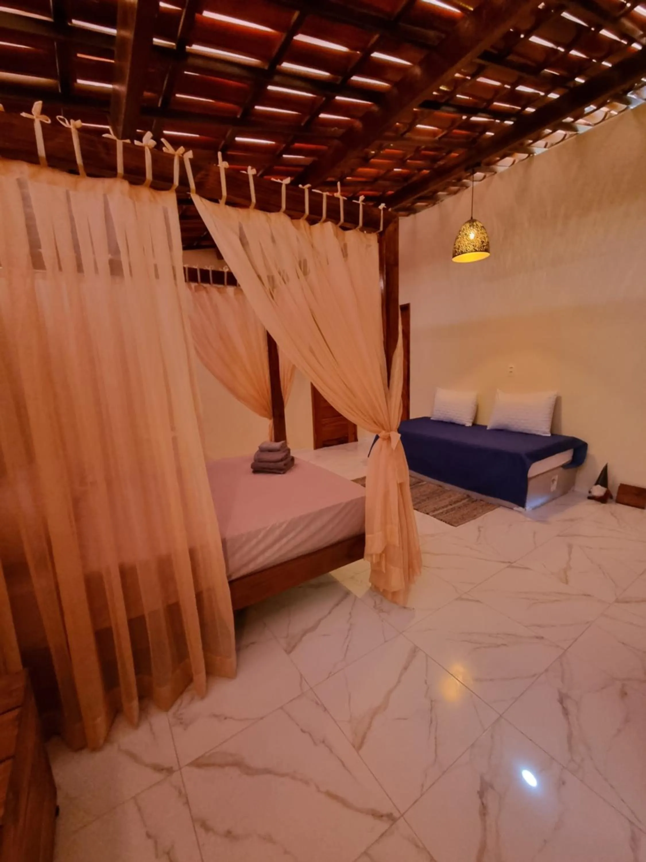 Bed in Casa Ferreira Cumbuco