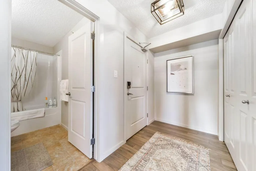 Shower in Bright Luxe Condo, AC, Top Floor, King Bed, Balcony!