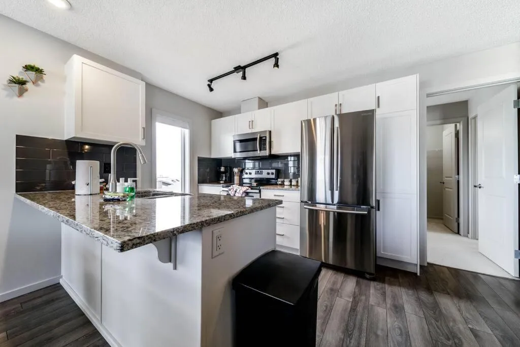 Kitchen or kitchenette in Bright Luxe Condo, AC, Top Floor, King Bed, Balcony!