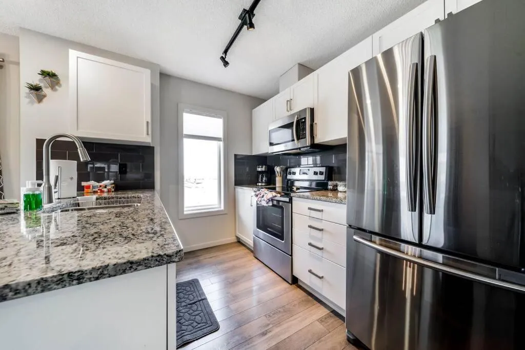 Kitchen or kitchenette in Bright Luxe Condo, AC, Top Floor, King Bed, Balcony!