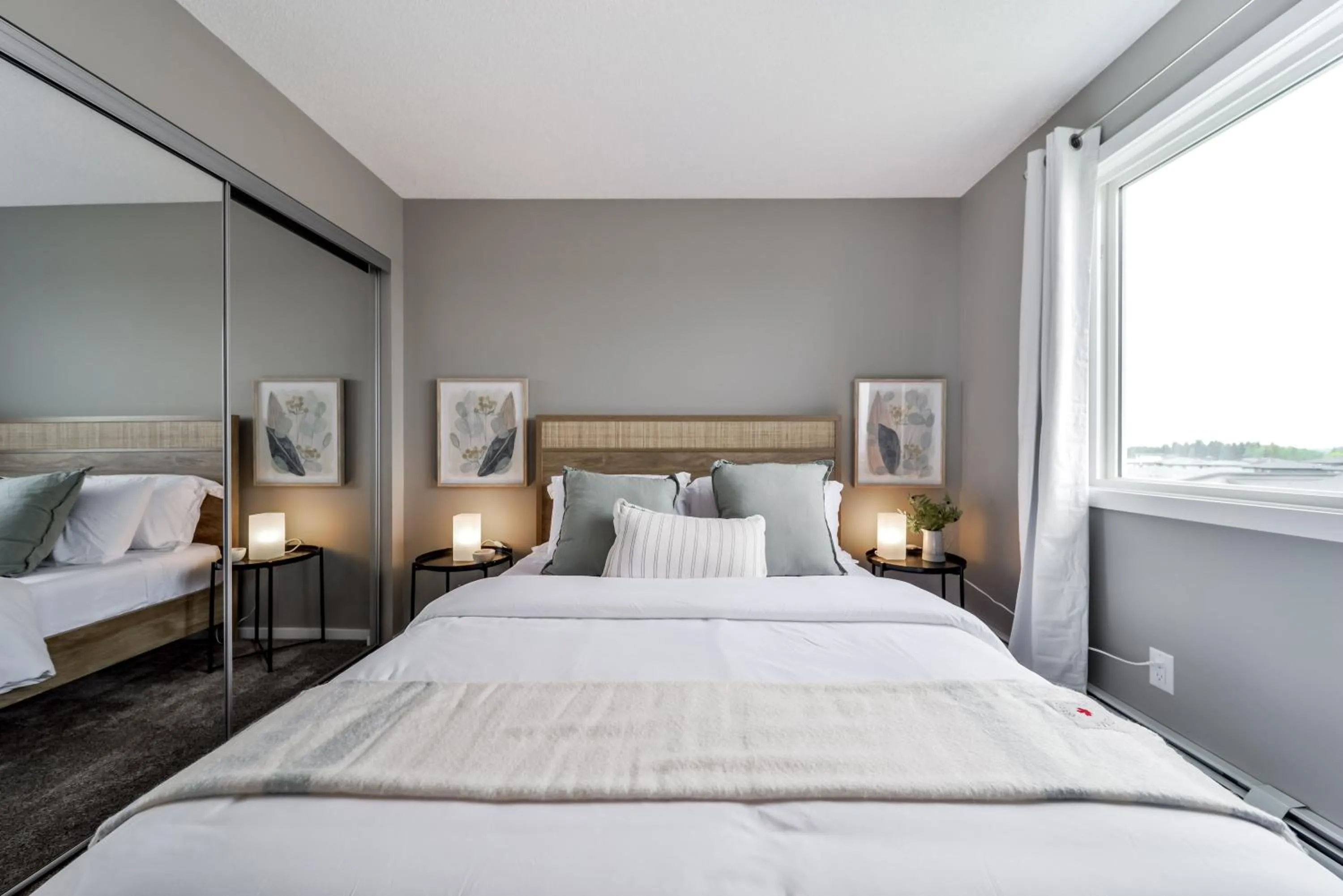 Bed in Peaceful Oasis Condo, AC, Top Floor, Secure UG Parking, Balcony, King Bed!