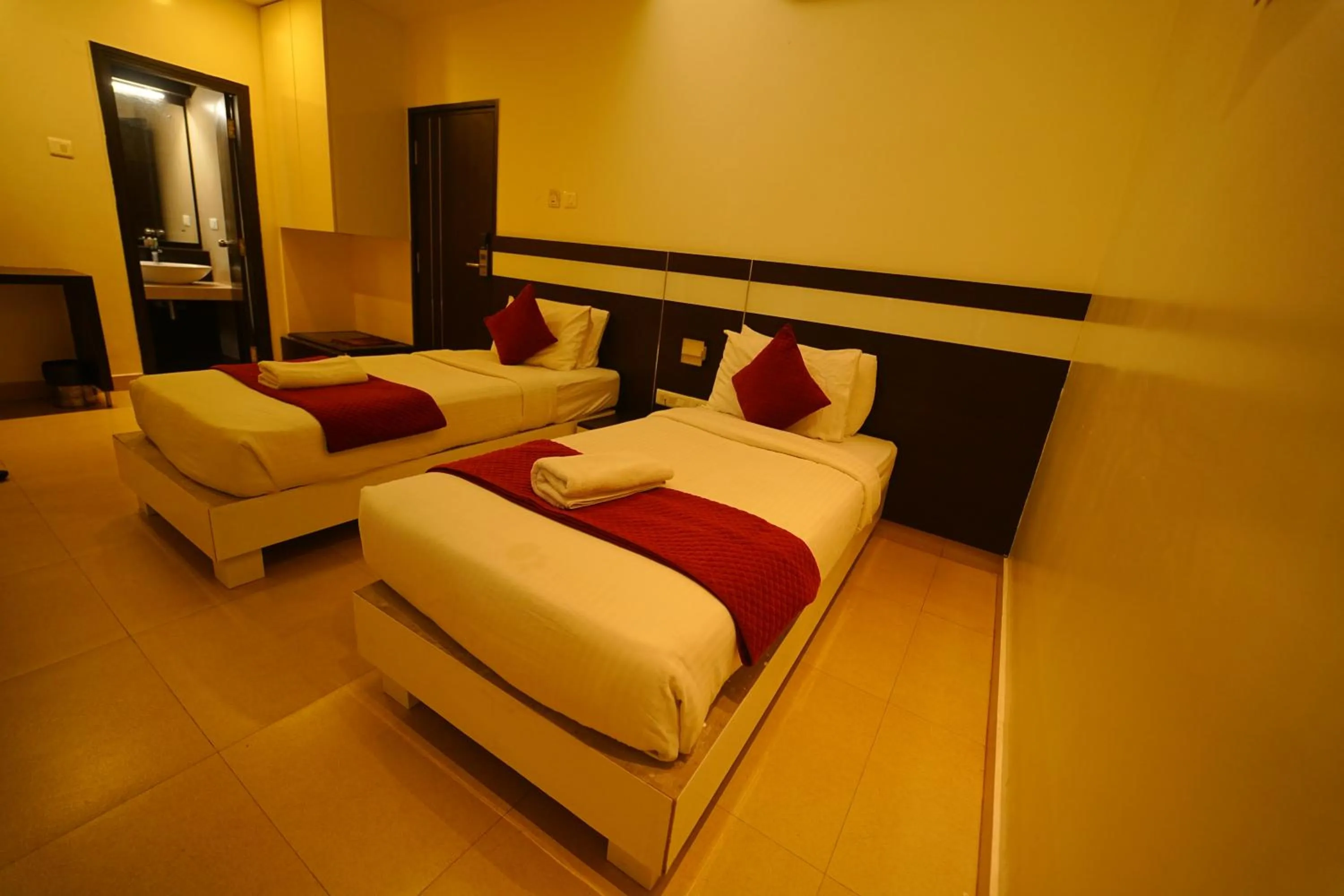 Bed in Yuvraj Palace Inn