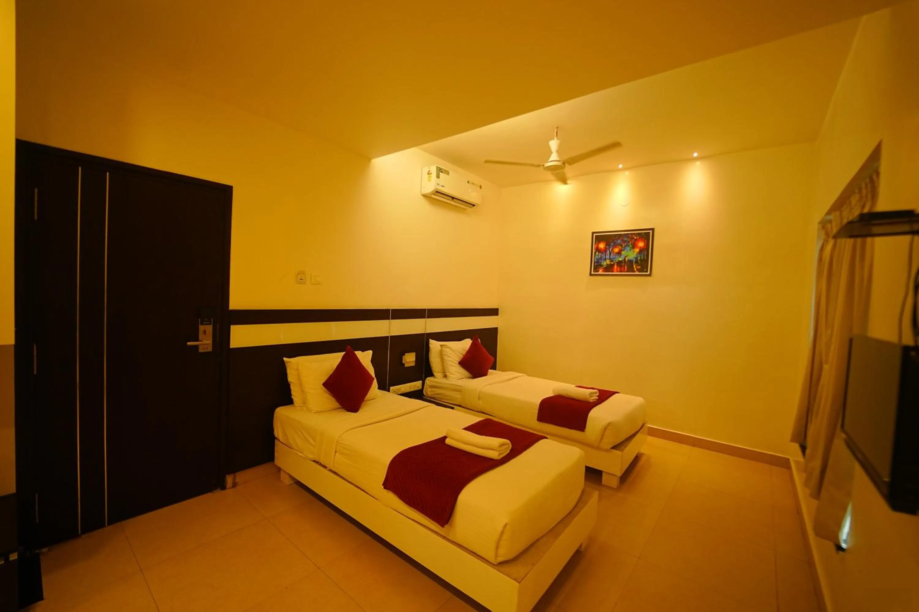 Bed in Yuvraj Palace Inn