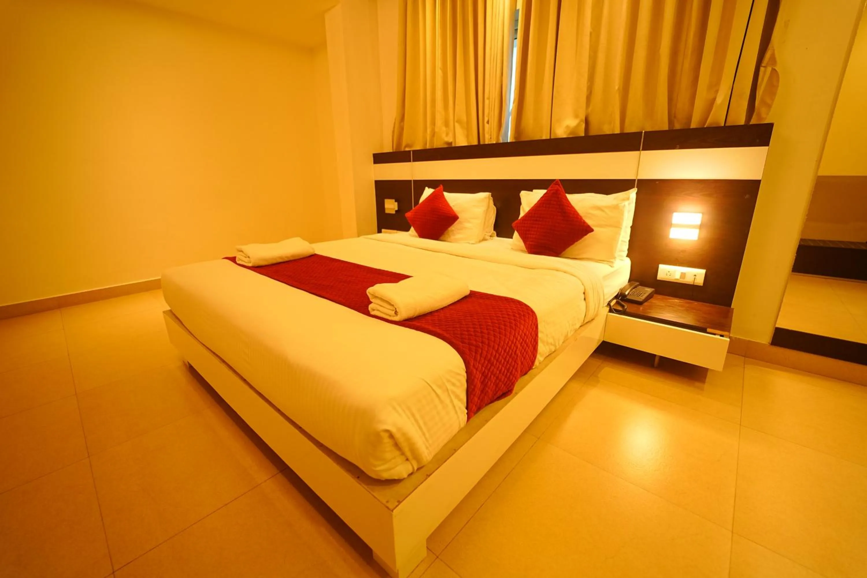 Bed in Yuvraj Palace Inn