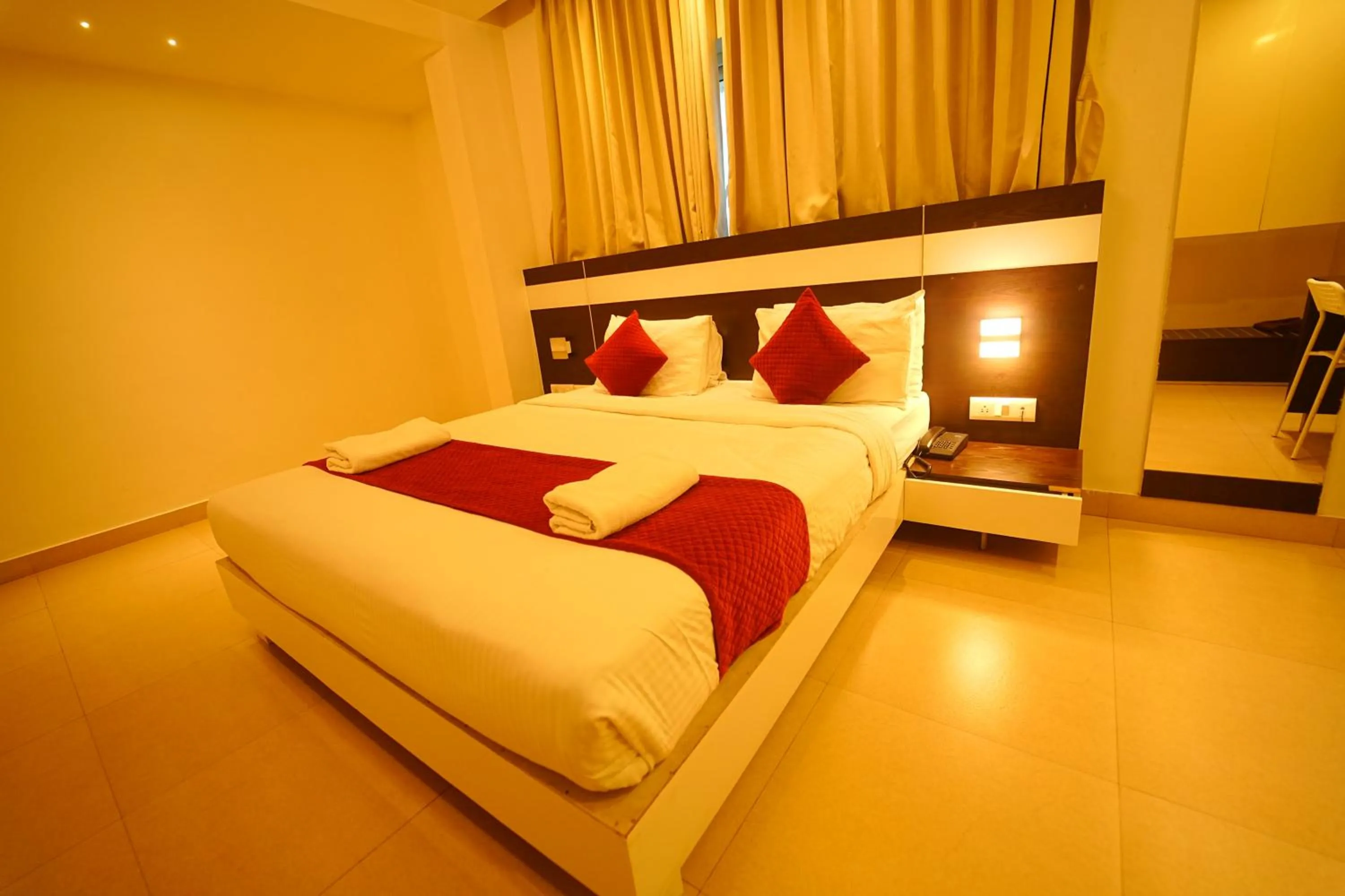 Bed in Yuvraj Palace Inn