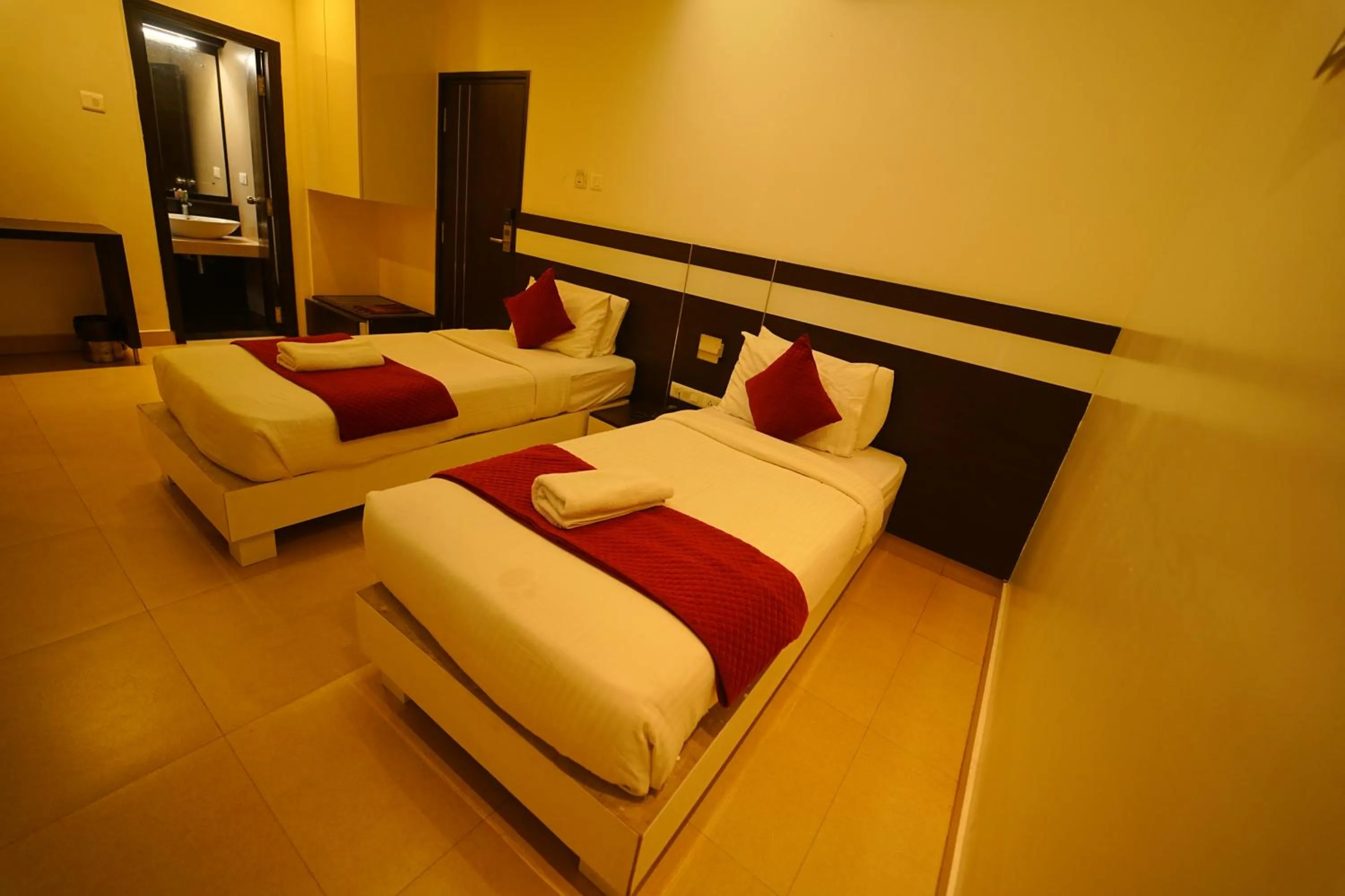 Bed in Yuvraj Palace Inn