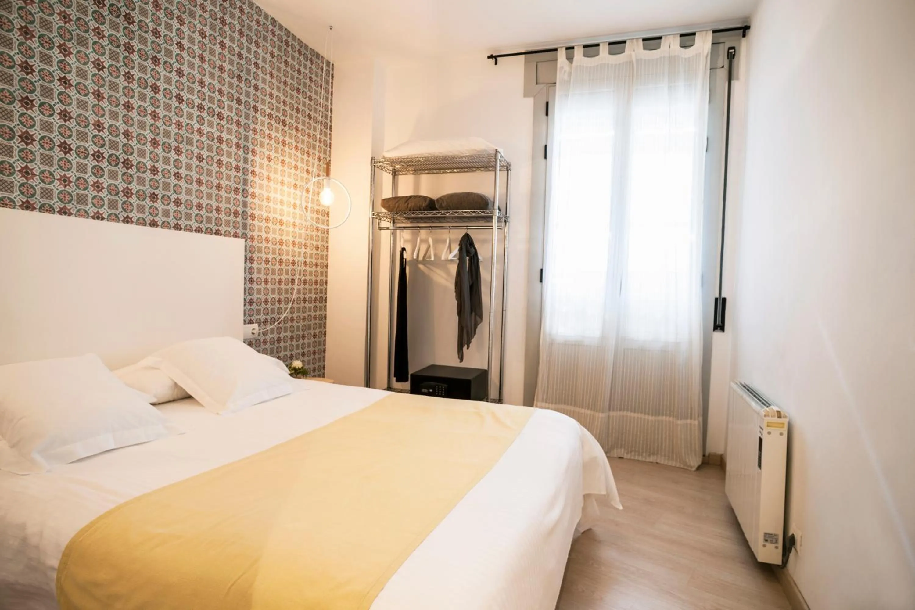 Bed in Feelathome Center Apartments