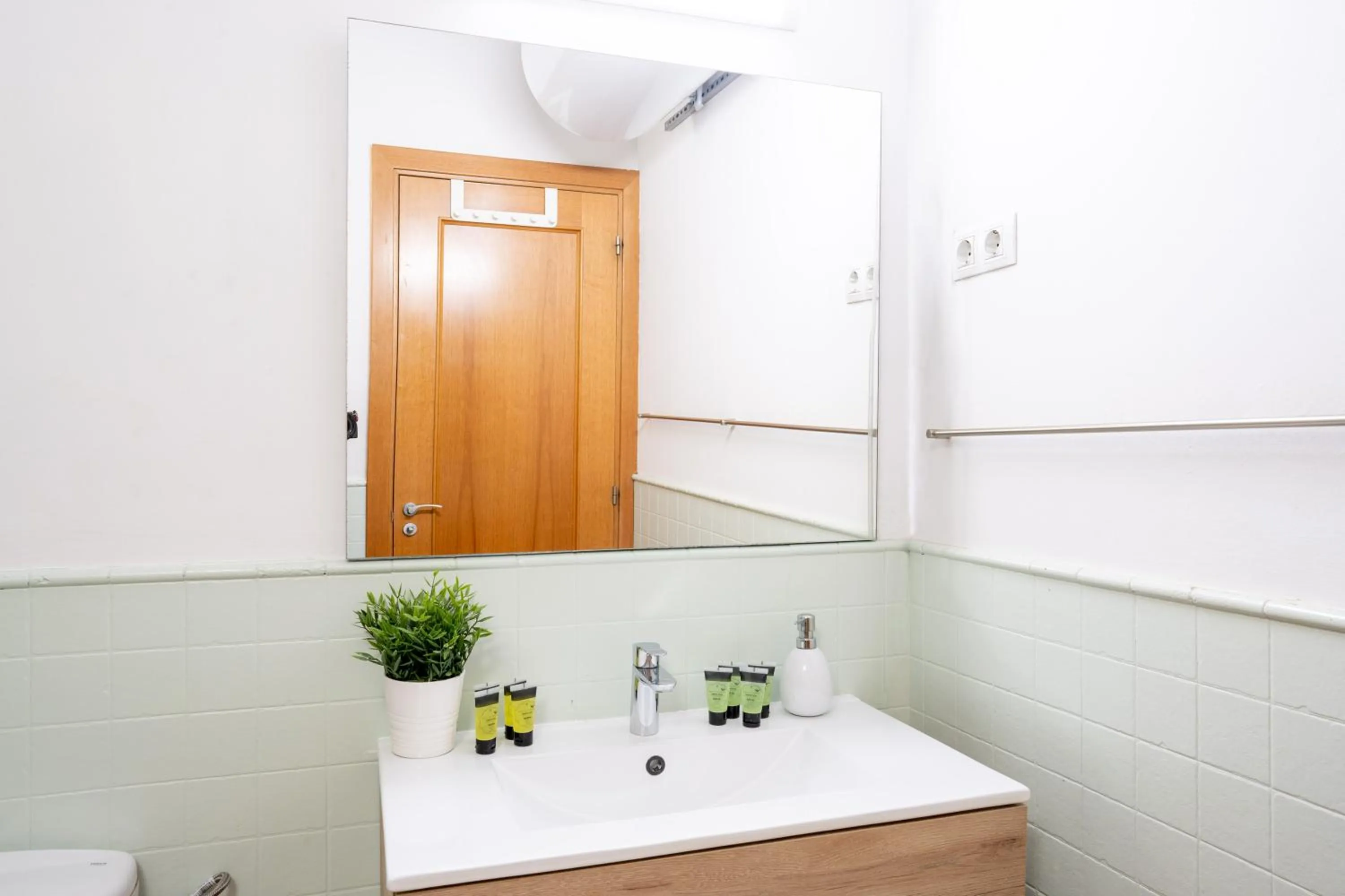 Toilet in Feelathome Center Apartments