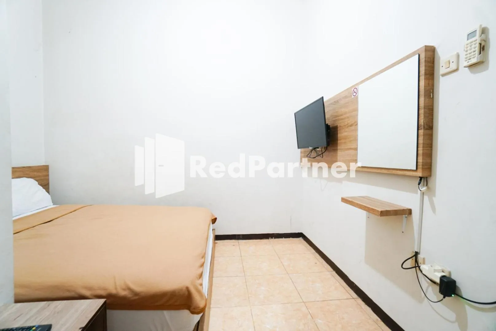 Bedroom, Bed in Bright Residence near ITC Mangga Dua Mitra RedDoorz