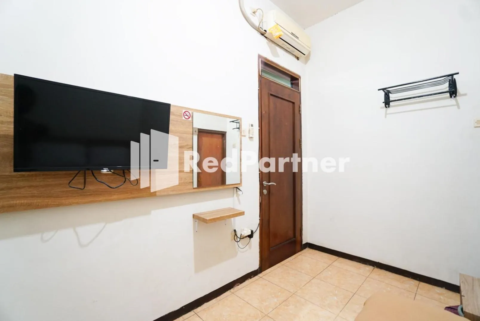 TV and multimedia in Bright Residence near ITC Mangga Dua Mitra RedDoorz