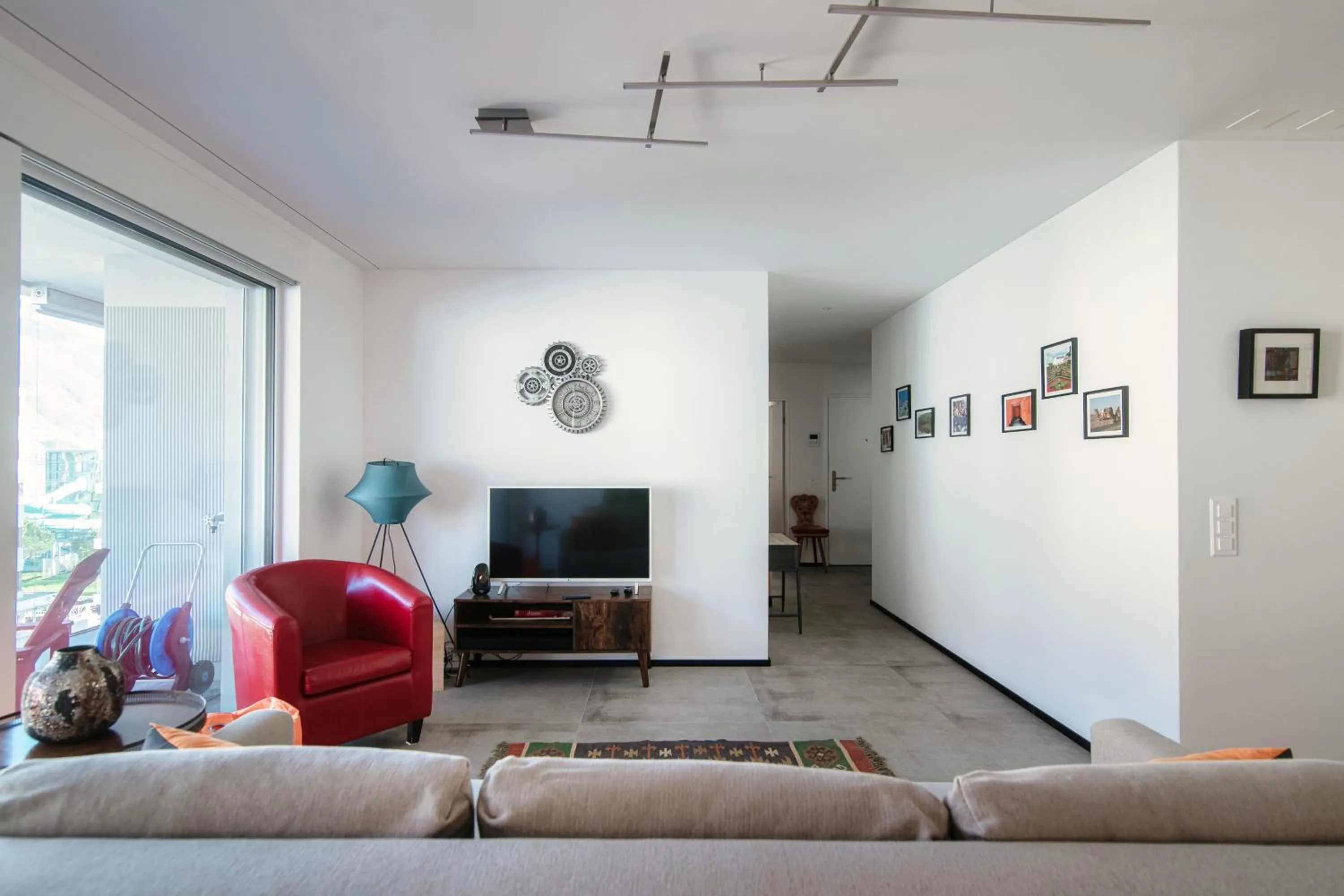 TV and multimedia in Casa Leini by Quokka 360 - two-bedroom apartment 3 minutes from Lido di Locarno