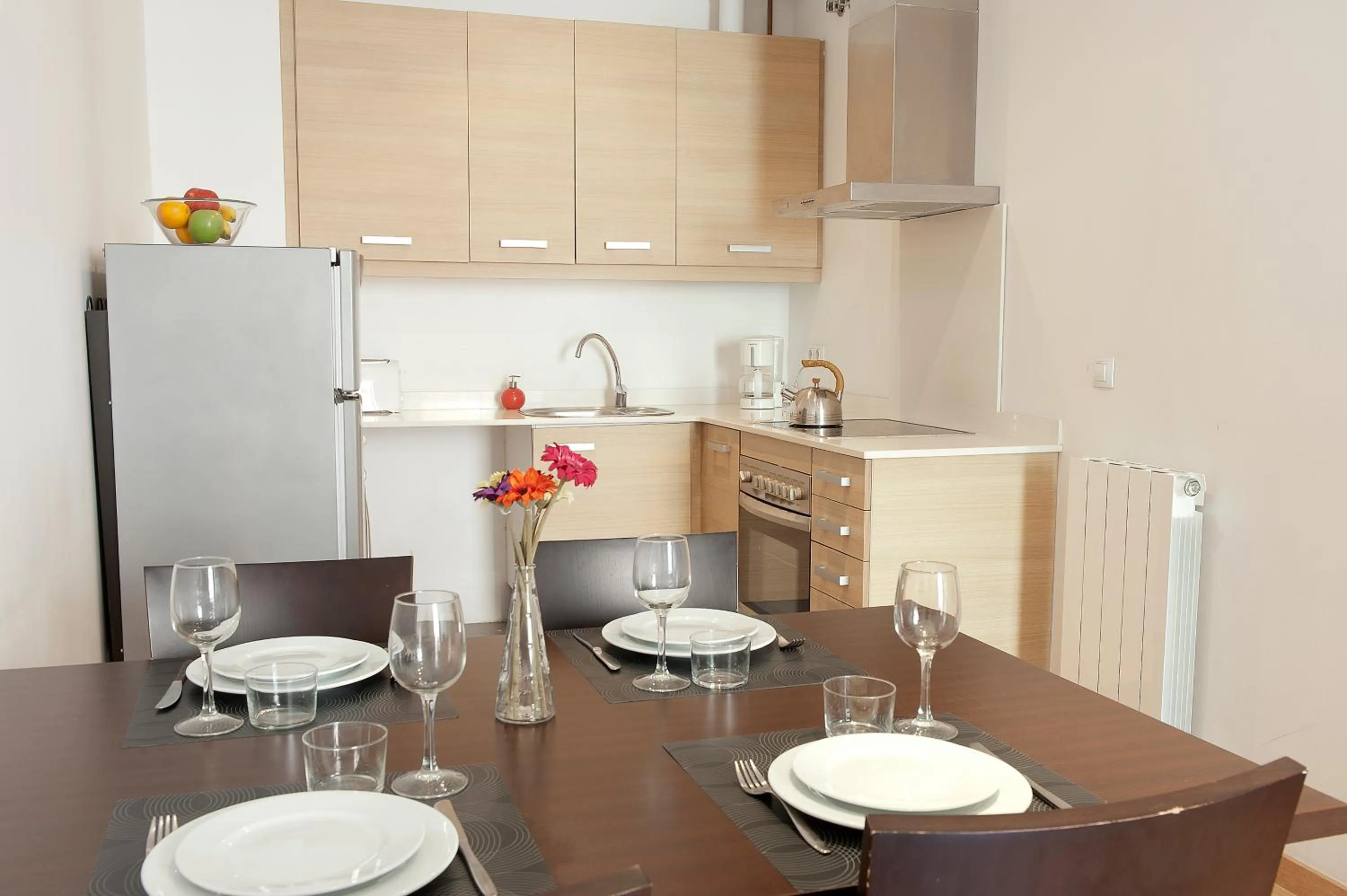 Kitchen or kitchenette in MH Apartments Liceo